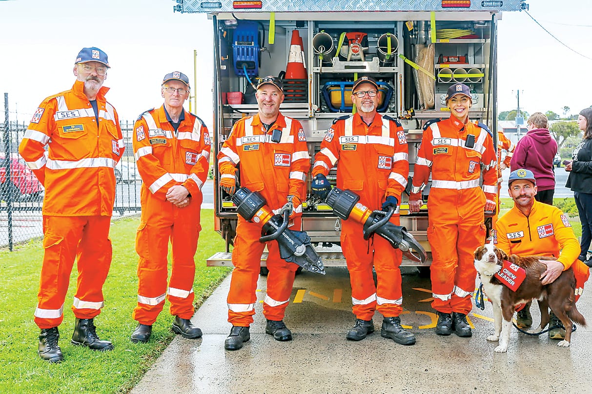 Above: Ed Moran, David Sparks, Pat Barnes, Paul Tandberg, Maida Phillips, Graeme Ward and Alby the dog were ready for demonstrations during the open day.Left: Xavier Davies from Warragul gets a feel for one of the SES unit's high function hoses.