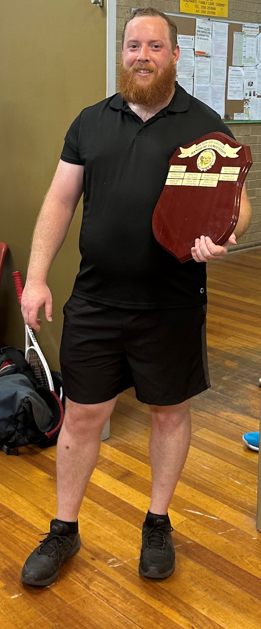 Handicap tournament winner Michael McKay with his trophy.