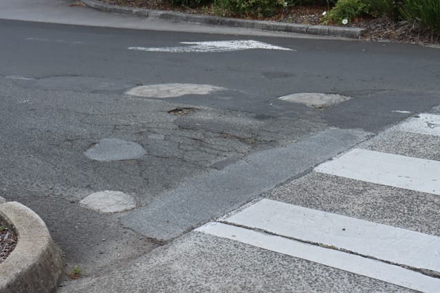 Pot Holes Woolies Carpark - 10.02.2022