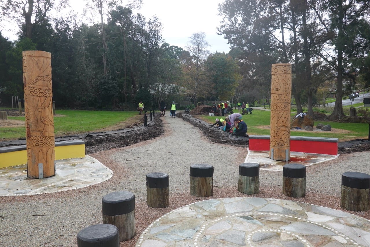 More than 40 community volunteers and Rotarians planting native grasses in the Indigenous Art Garden at Rotary Park in Warragul