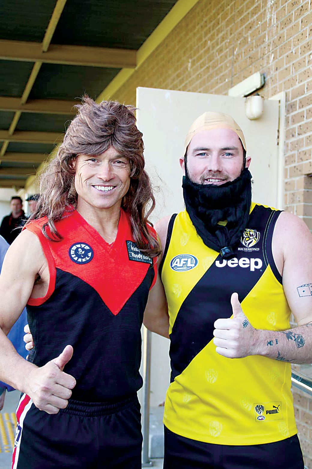 Warragul Football Netball Club head of football operations Dean Hendrikse (left) and senior football coach Jed Lamb join the 