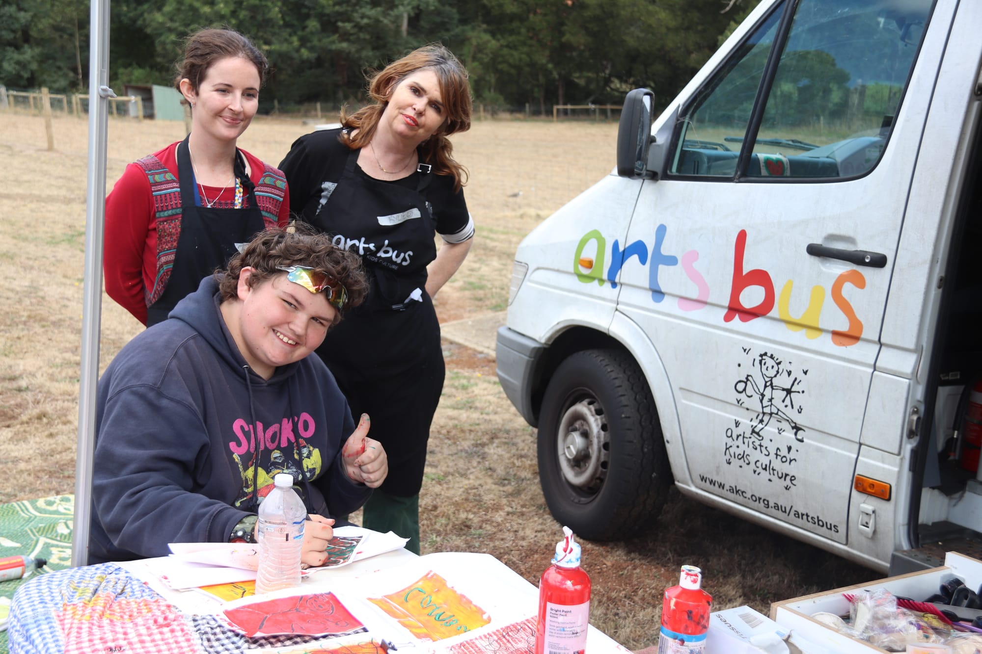 Artists for kids' Gen Townsend and Kylie Greer with CCG student Cambell McPherson