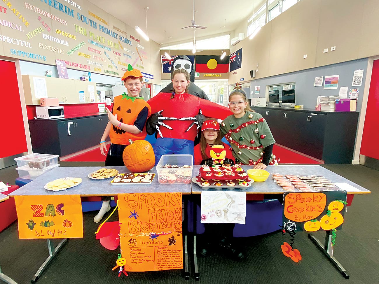 Selling a wide range of Halloween themed baking are Zac, Violet, Alexia and Rosie.