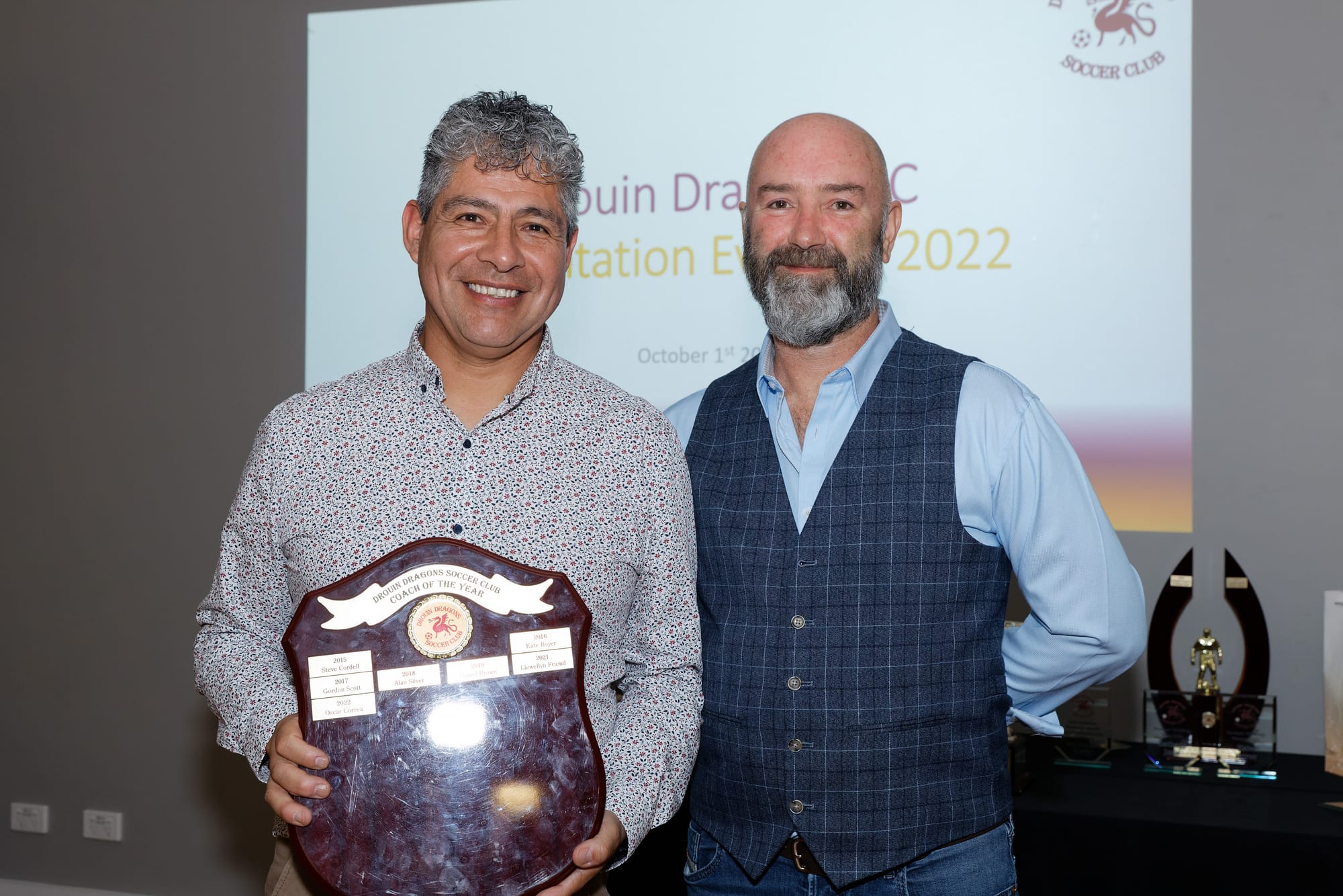 Coach of the year Oscar Correa and club president Jason Beer.