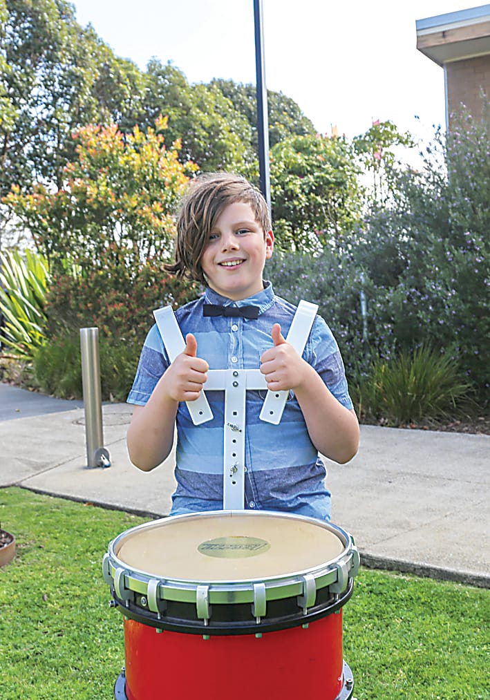 Alfie Bucknall was keen to take part in the Warragul Municipal Band marching drums workshop.
