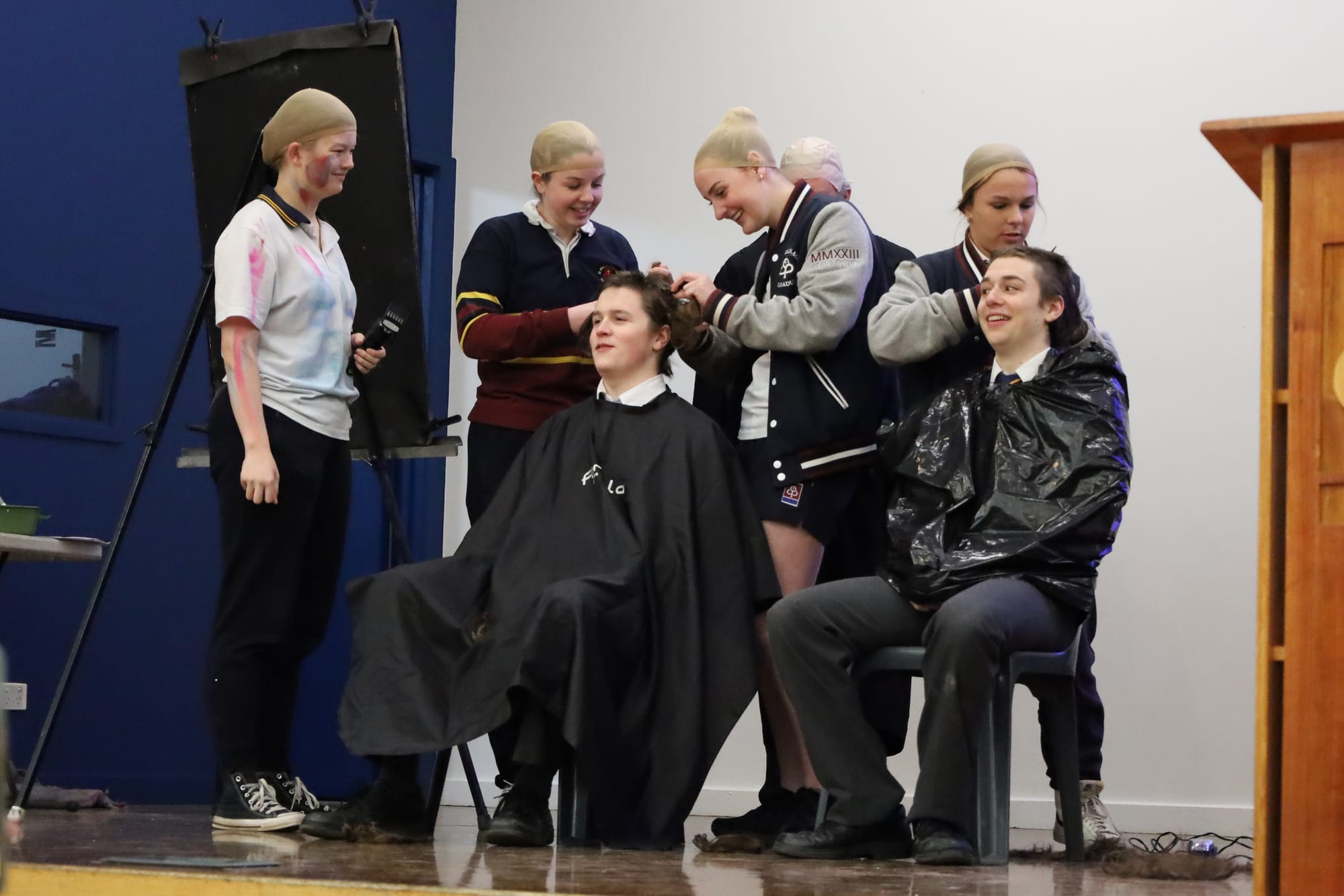 Braving the shave are Noah Smith and Pablo Neofitou.