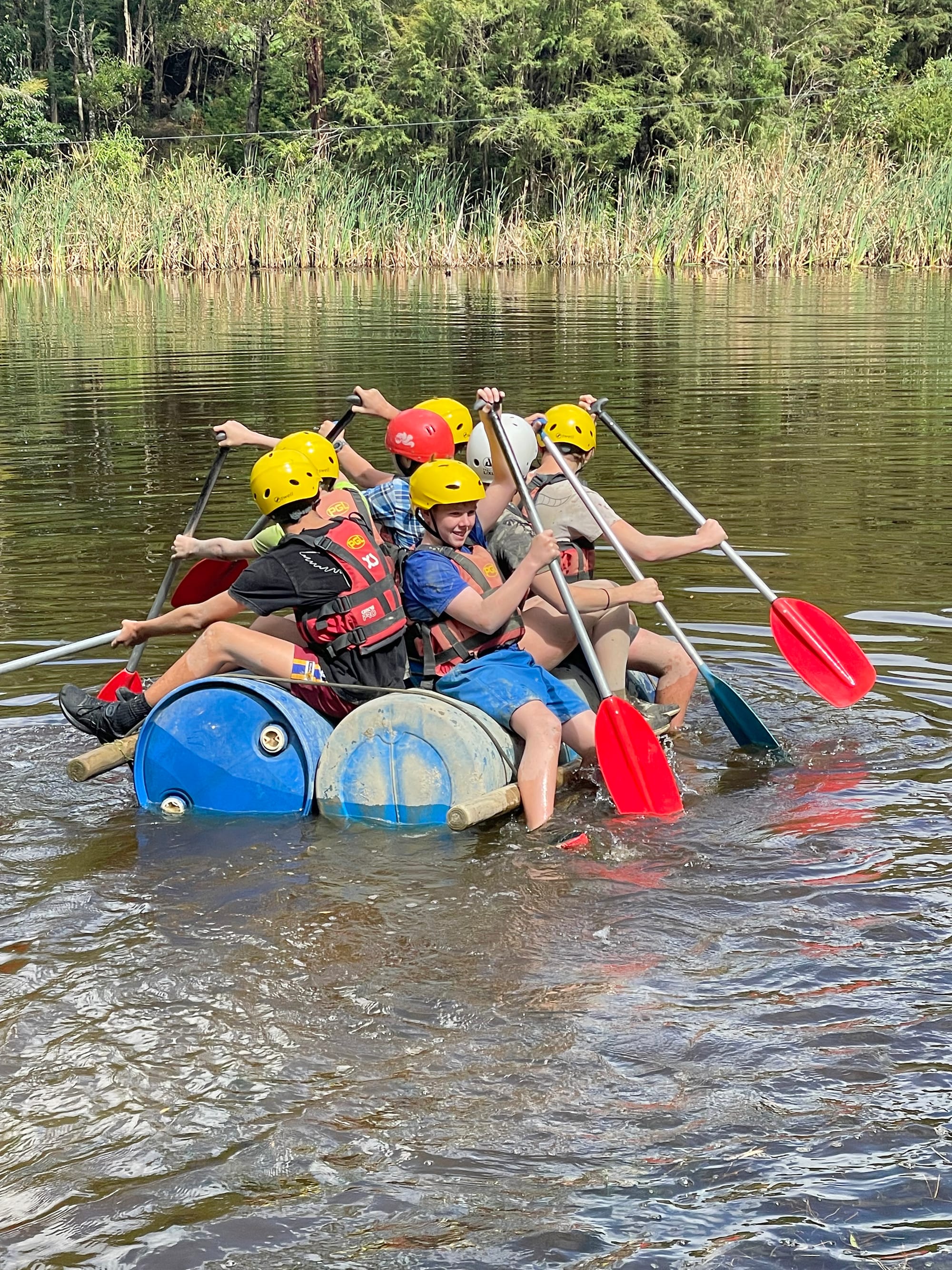 A group of students starting year seven at St Paul's Anglican Grammar School put the makeshift raft they built to the test during a school camp to kick start the new year and beginning of their secondary education.