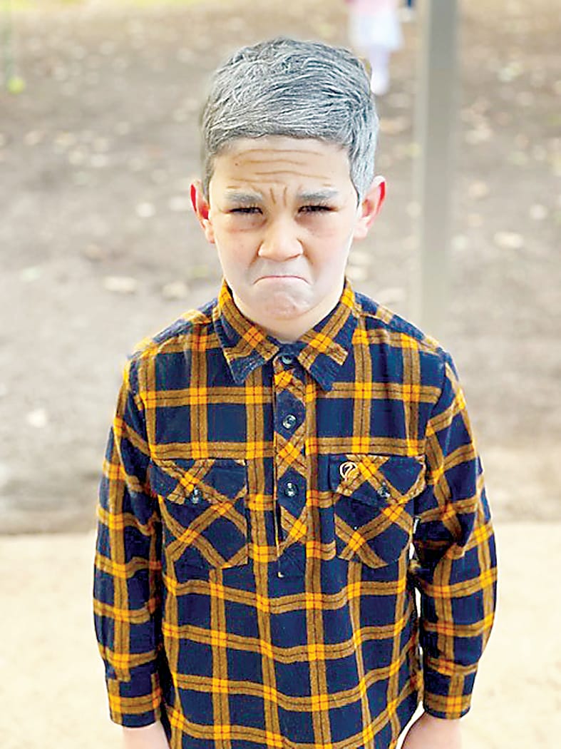 Student Noah Anderson-Wright gives his best 'grumpy old man' face.