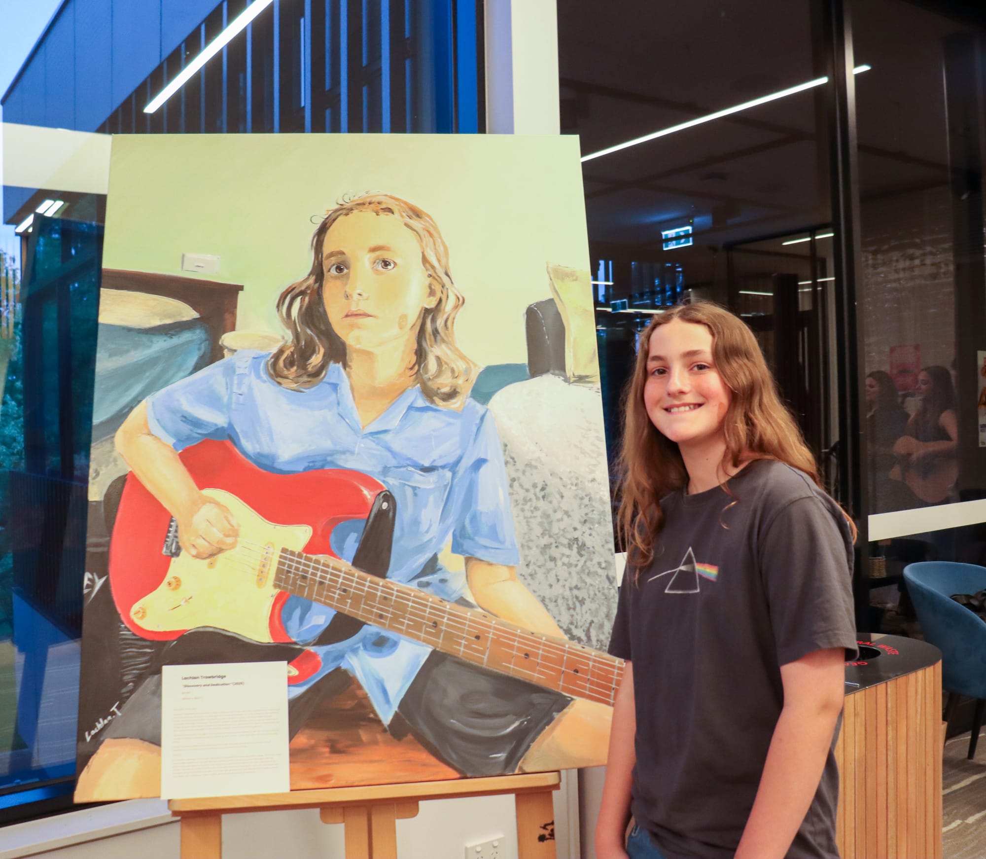 Young artist Lachlan Trowbridge spent 100 hours creating a self-portrait of himself playing guitar.