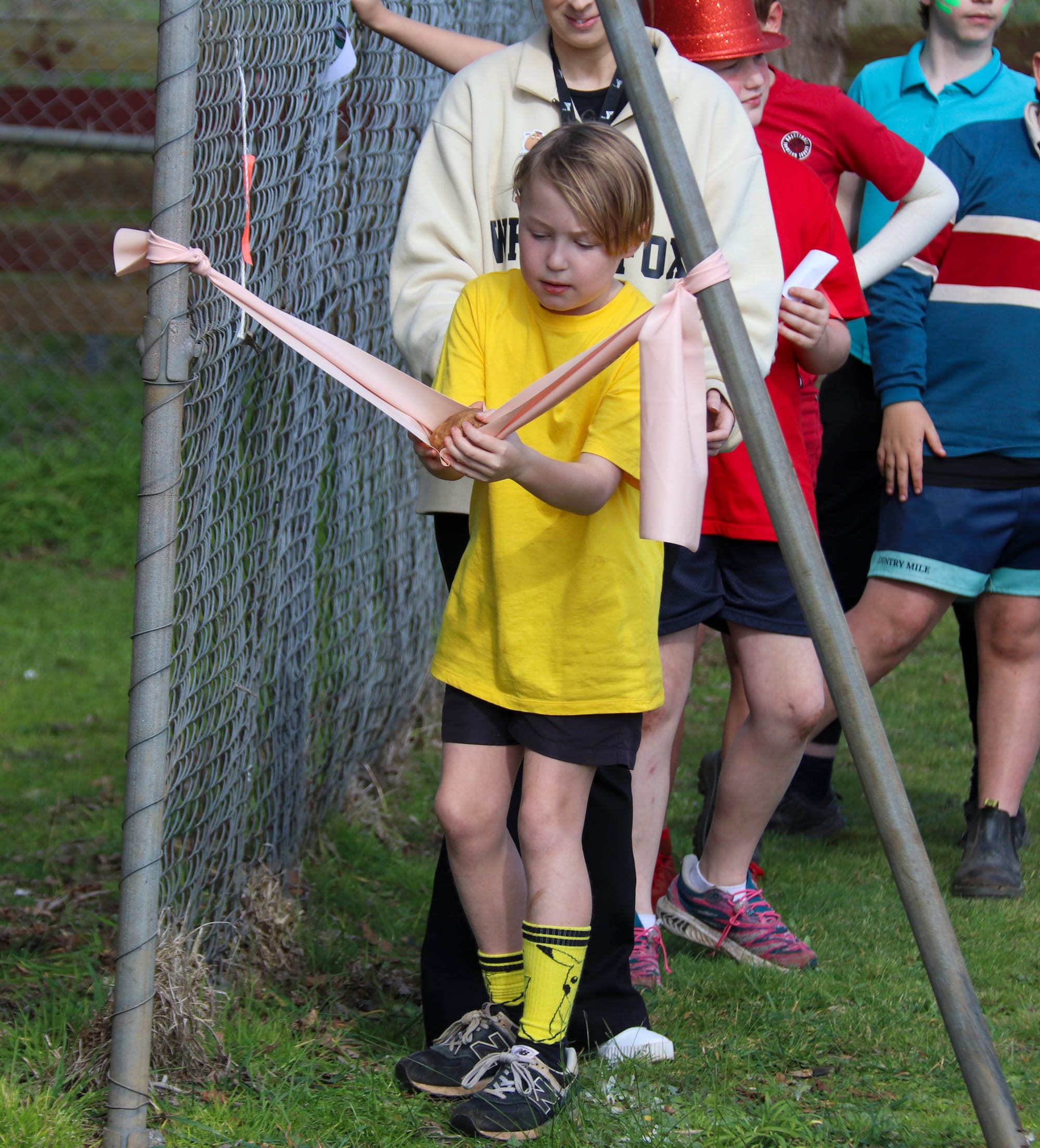 Carefully placing his potato is Logan Gaskell.