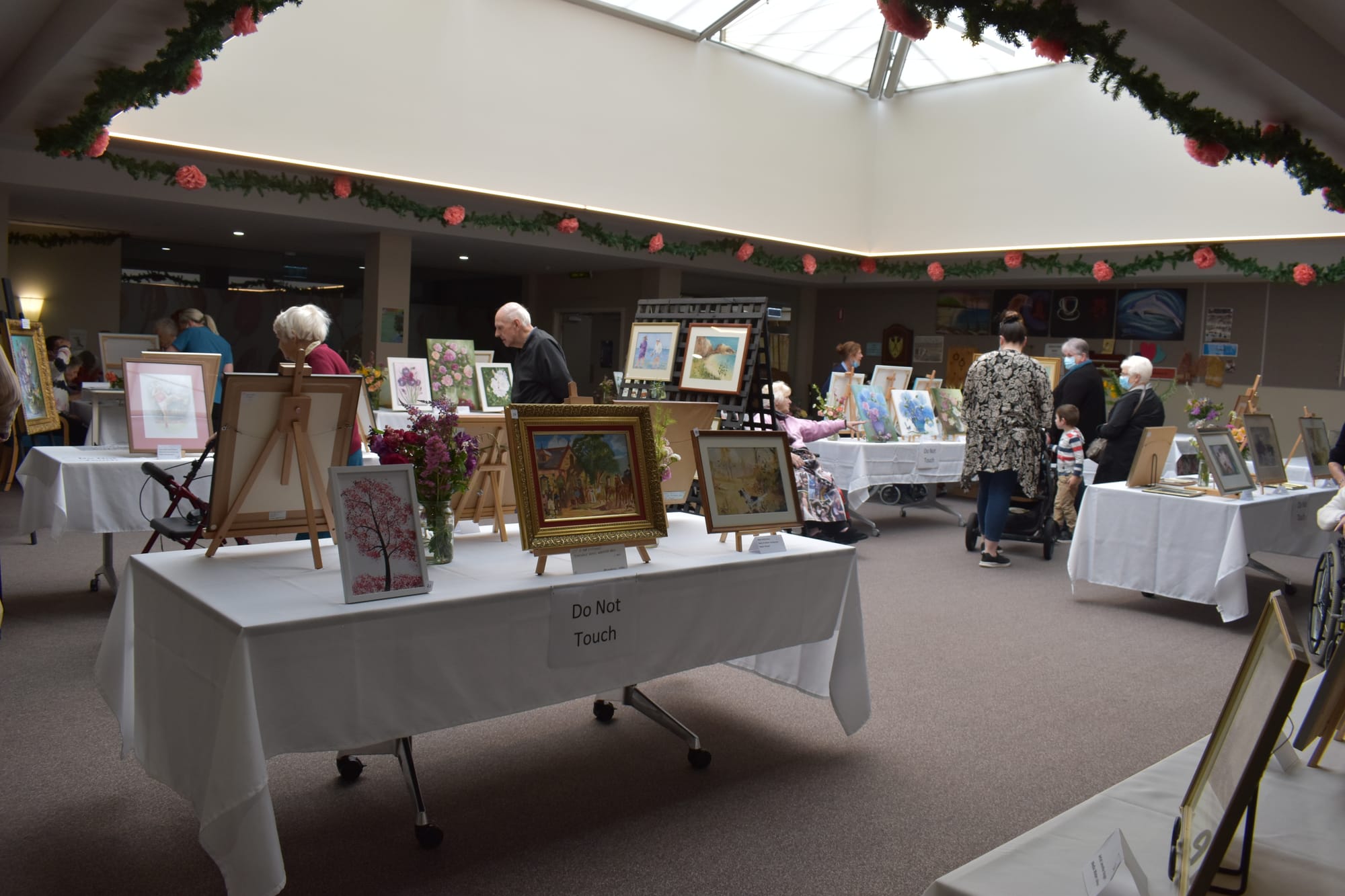 About 60 paintings were on display at the exhibition.