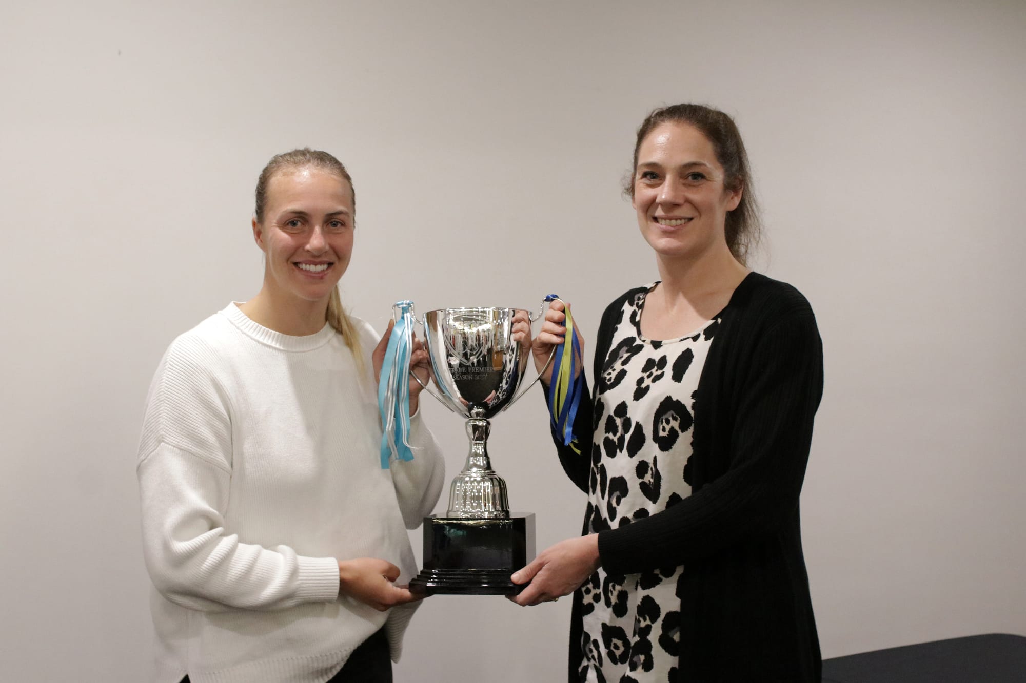 Will Cats or Eagles win A grade cup?