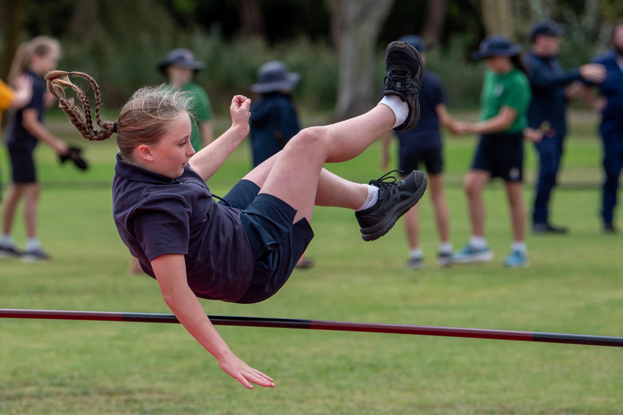 Taylah Chapman makes a steady landing in the high jump.