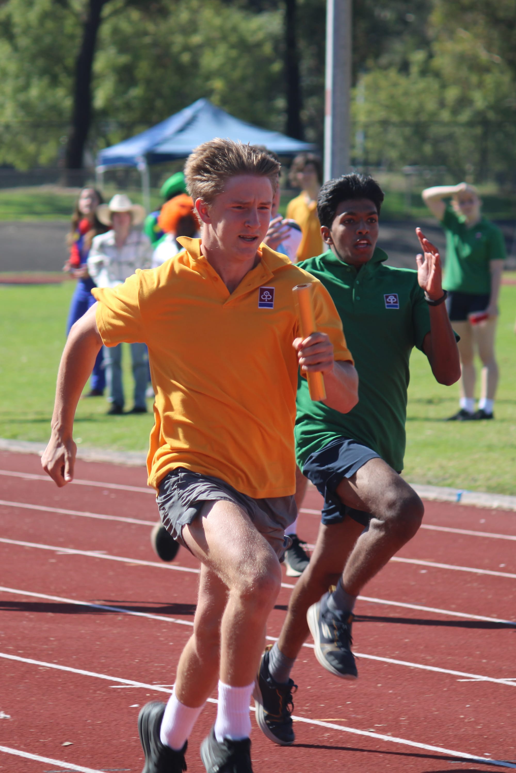 Year 11 students Alby Phillips and Rayan Siraj race to the finish line.