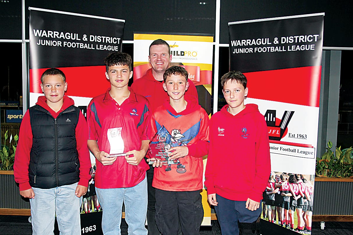 Accepting Buln Buln's awards for both under 12s code of conduct and overall code of conduct are Billy Bridger, Jaxon Scott, club president Michael White (behind), Nate Ellis and Lenny Heatley.