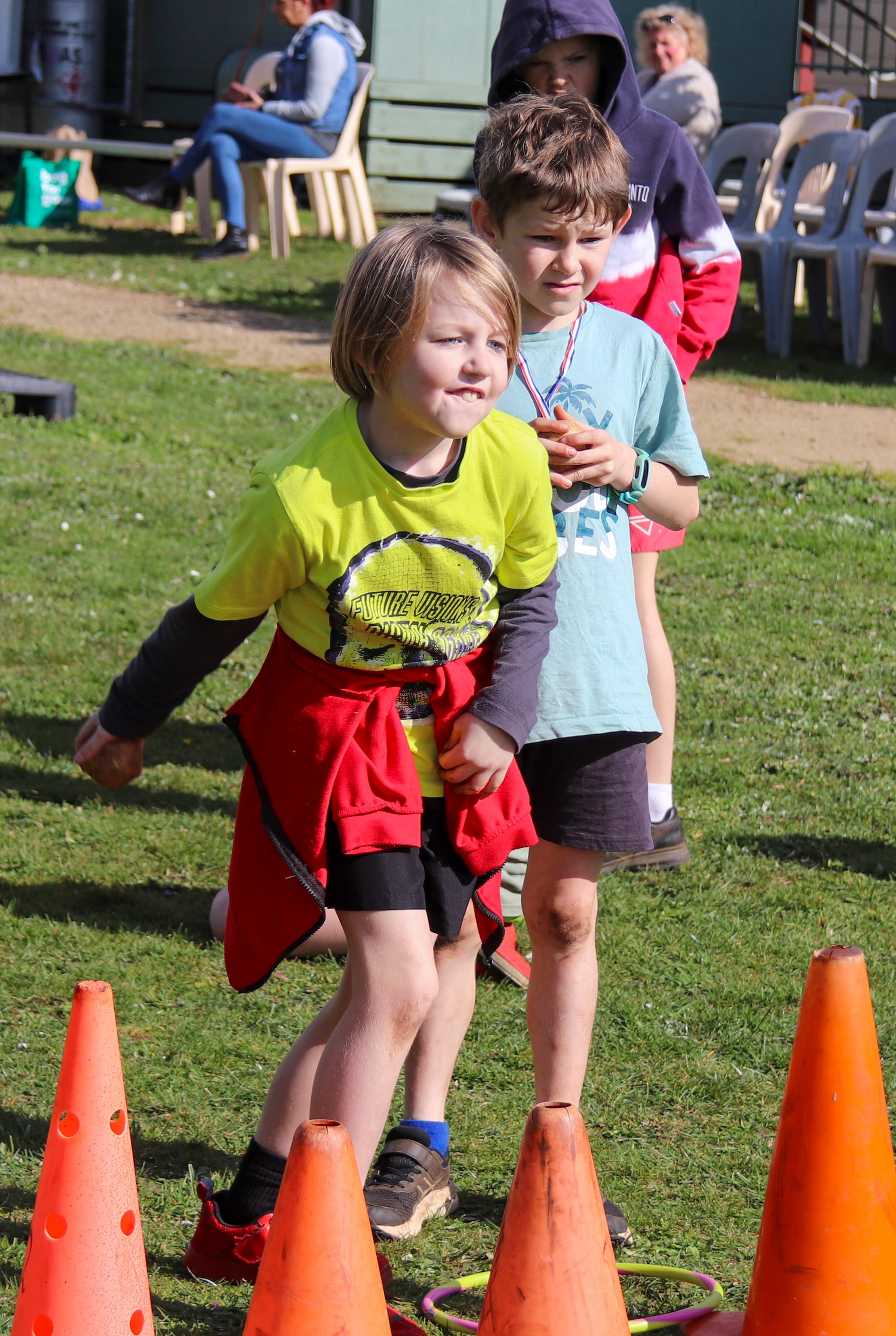 Aiming carefully with his throw is Jayden Gaskell as Jack Parker watches on.