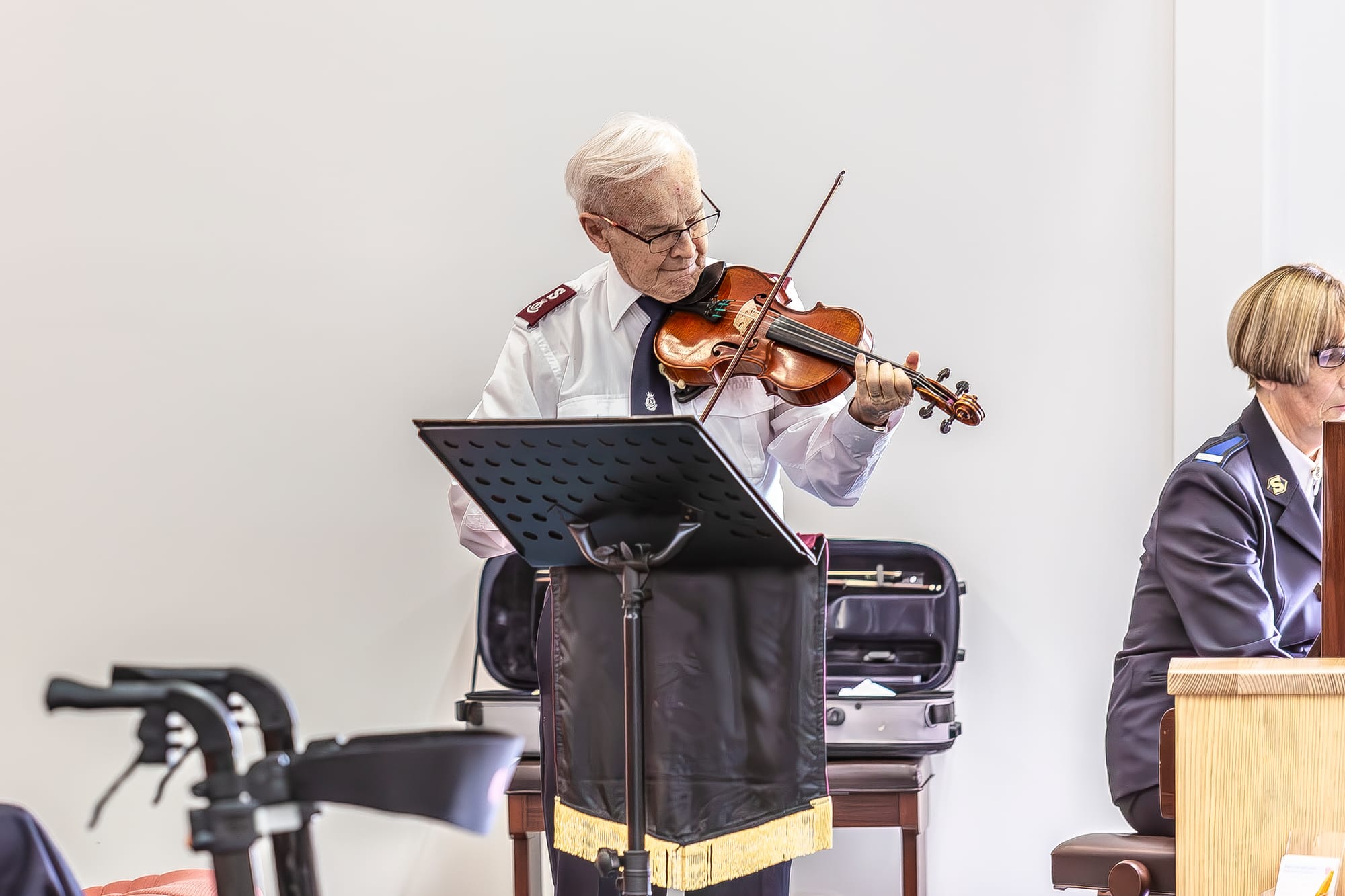 Major Howard Davies plays the violin.