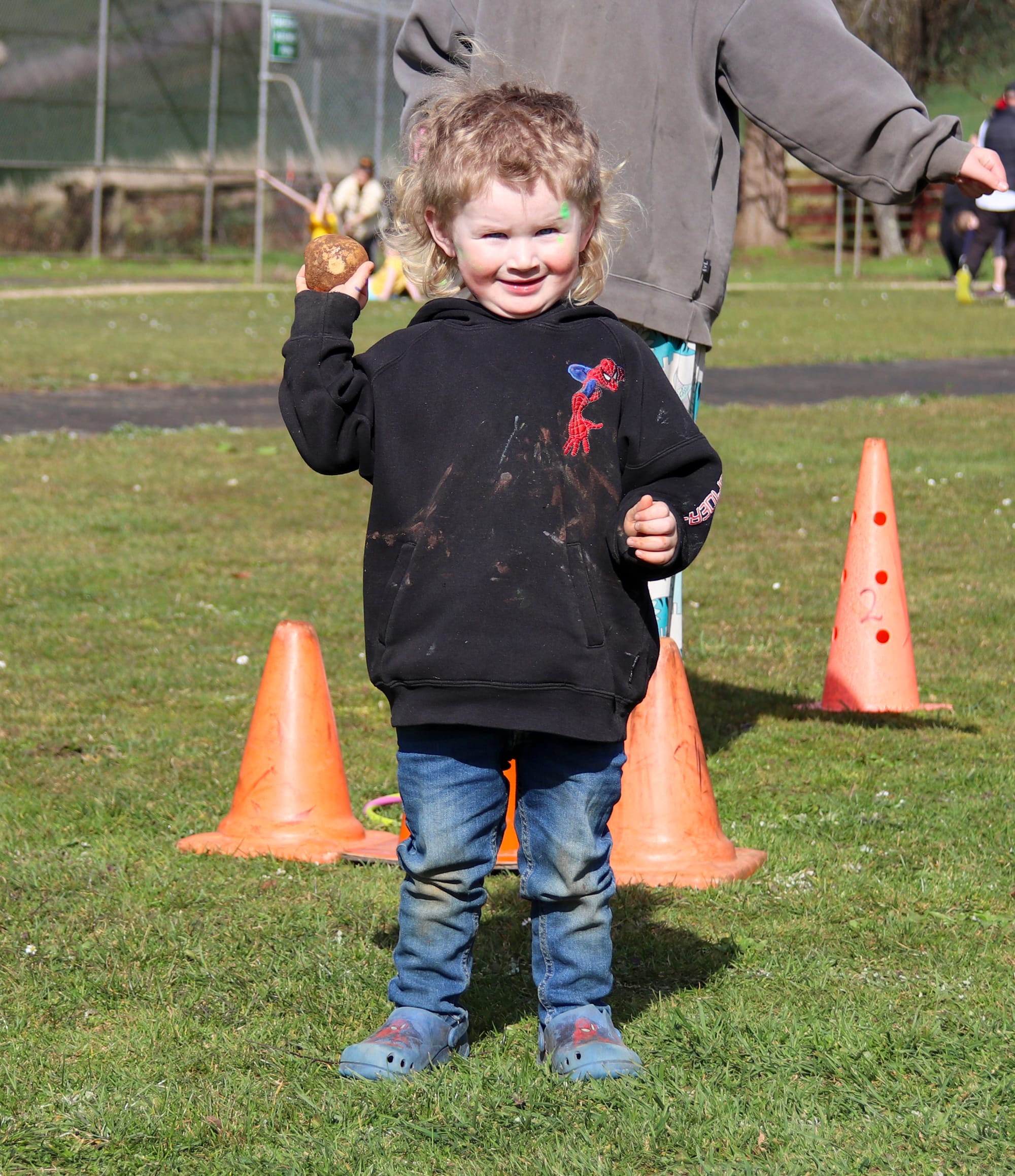Little Brodhi Wright shows off his spud.