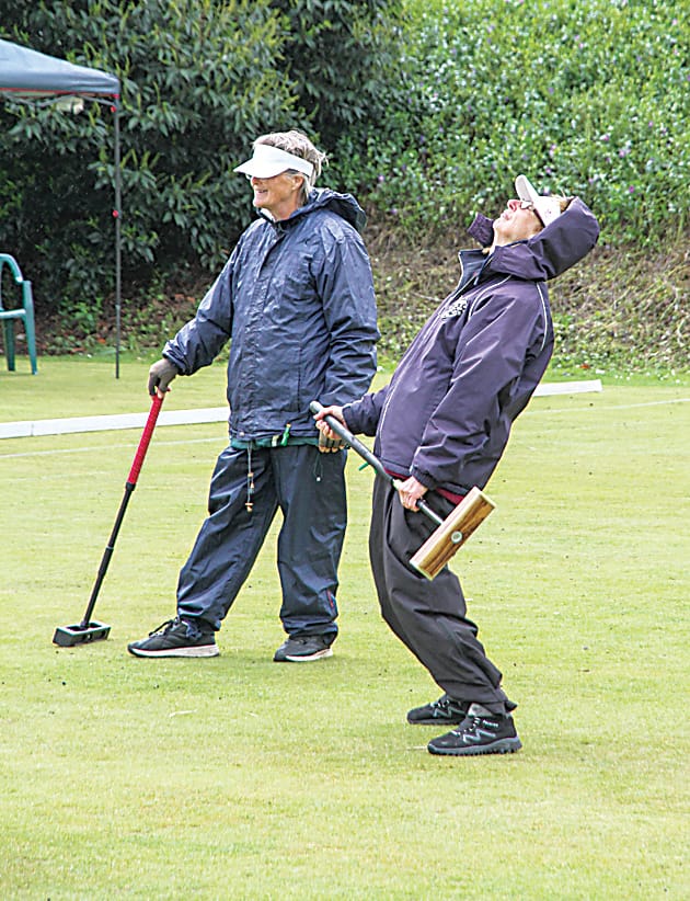 Reacting to a close miss are Kathy Ross and Christina Eldridge after a shot in the Warragul Croquet Club doubles tournament.
