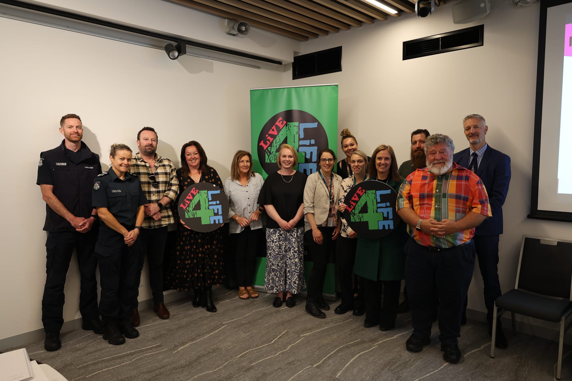 Above: Reflecting and planning future activities are the Baw Baw's Live4Life partnership group (from left) senior constables Warren Briggs and Paula Fowler, Brett Pedlow from Trafalgar High School, Donna Risley from the Department of Education, Sally Sandy from Warragul Regional College, Sara Cogo from Youth Live4Life, Claire Tartaro, Tanarly Hood and Audrey Matthews from Baw Baw Shire, Judy Linossier from Chairo Christian School, Callum White from Neerim District Secondary School, community member Barry Rogers and Daniel Lowe from St Paul's Anglican Grammar School.Right: Local secondary school students gather at The Summit Adventure Park in Trafalgar East to mark another successful year.