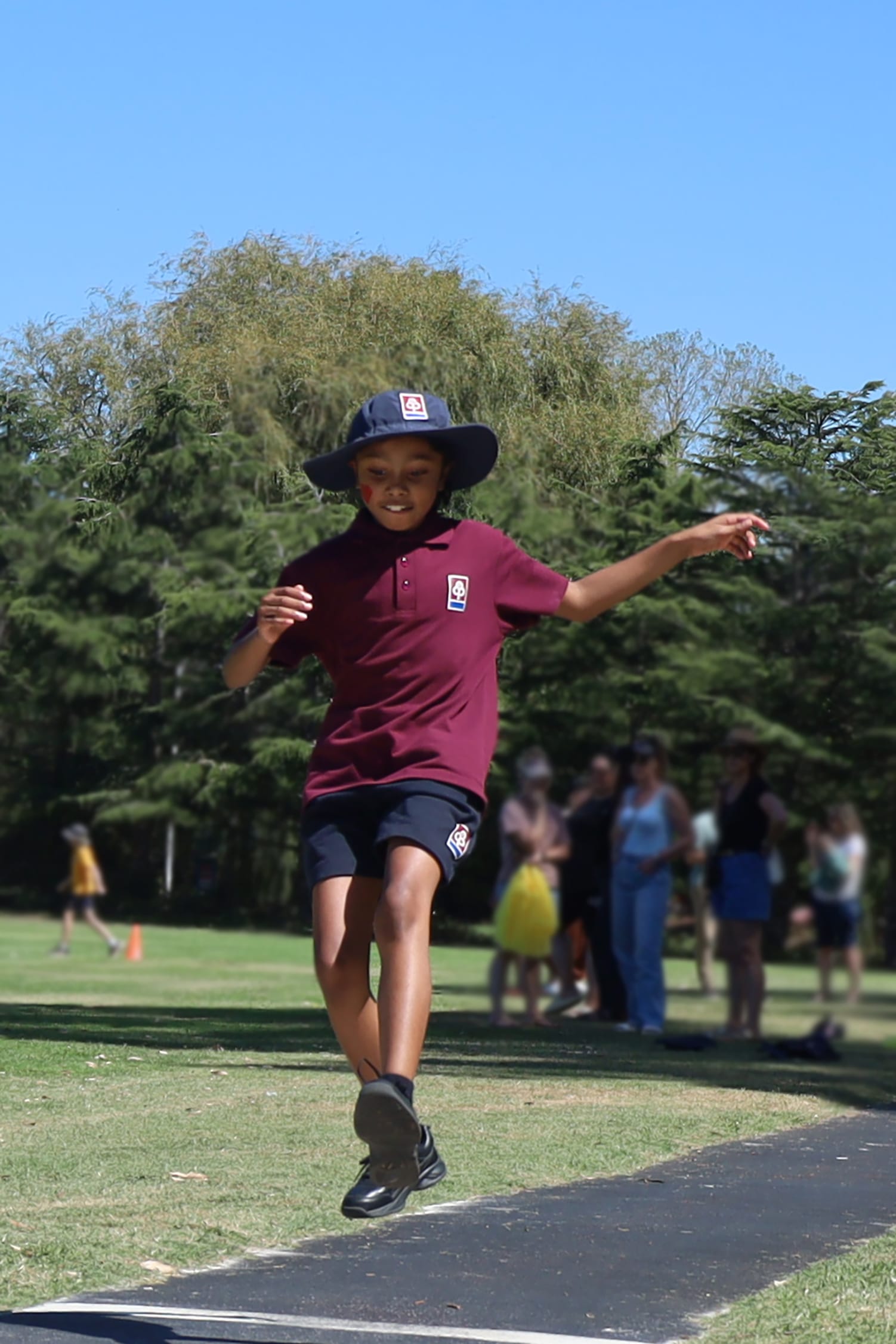 Year four student Shreya Alapati prepares to make the long jump.