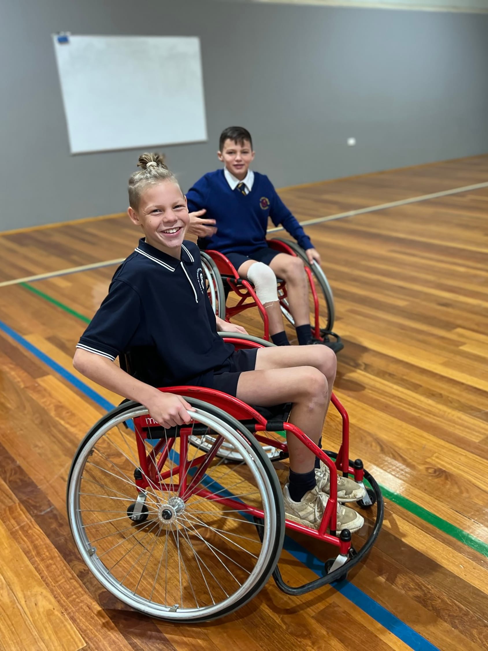 Olliver Muir and Jaxon Scott experiencing a modified sport for community connectedness.