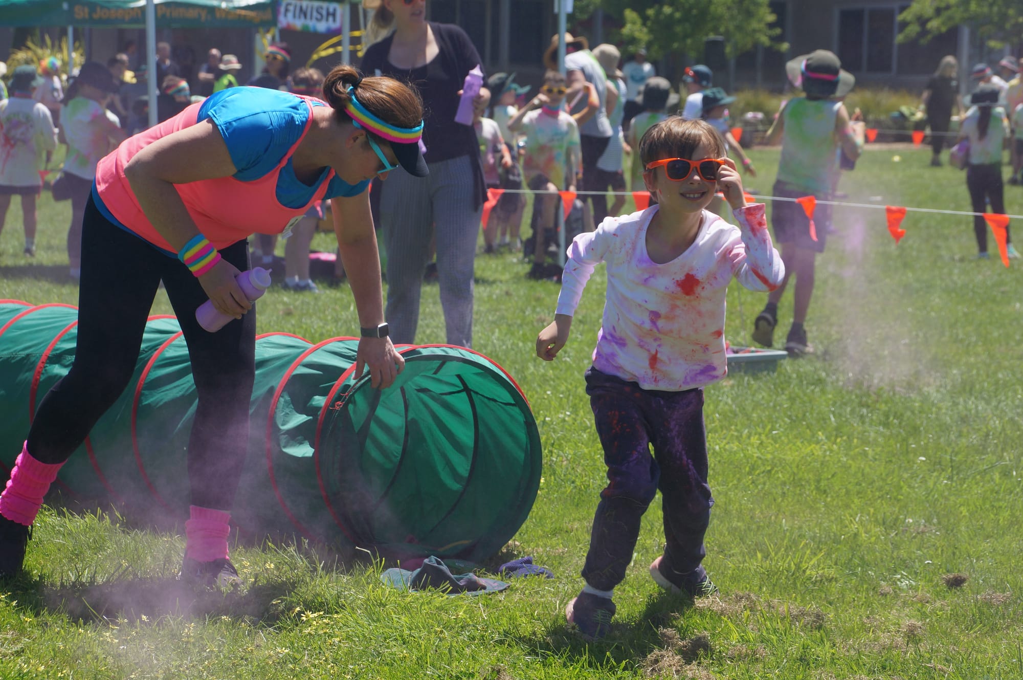 Ryan emerges from a tunnel during the Colour Run at St Joseph's, Warragul.