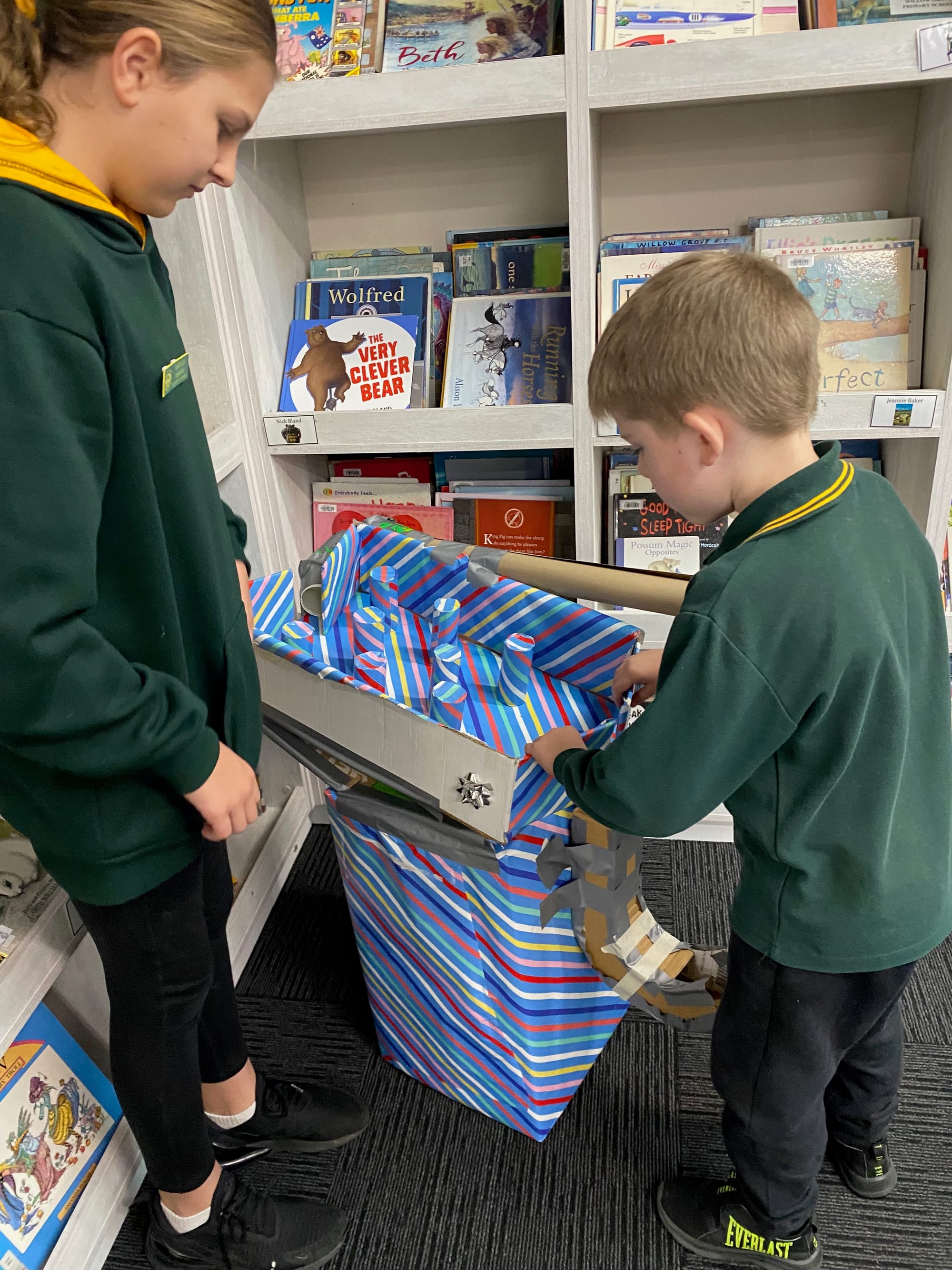 Jack playing Matilda's pinball machine