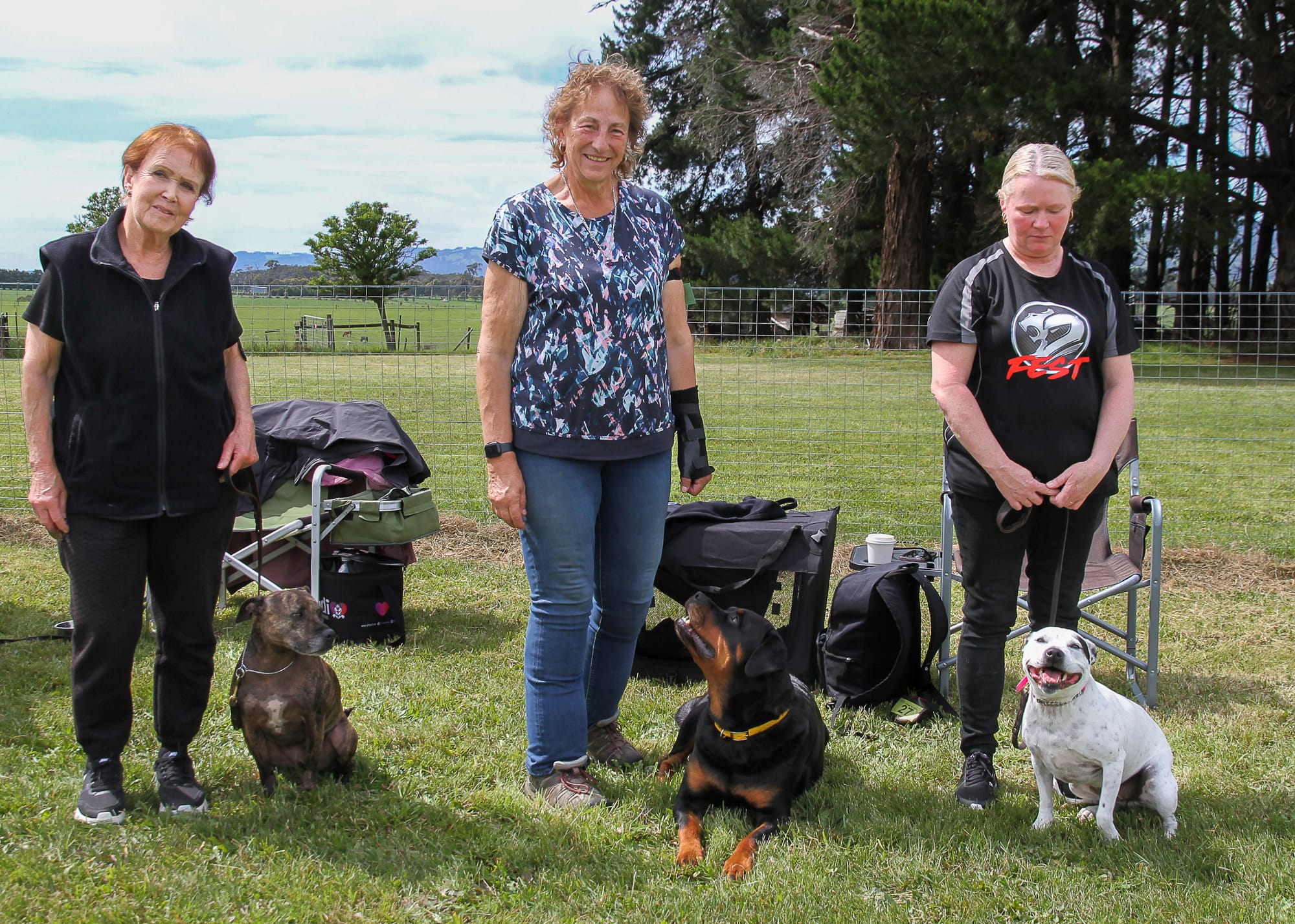 Participating in the Warragul Obedience Dog Club rally day are (from left) Sharn with her English Staffordshire 'Zara', Sue with her Rotweiler 'Candy' and Lee with her English Staffordshire 'Bella.'
