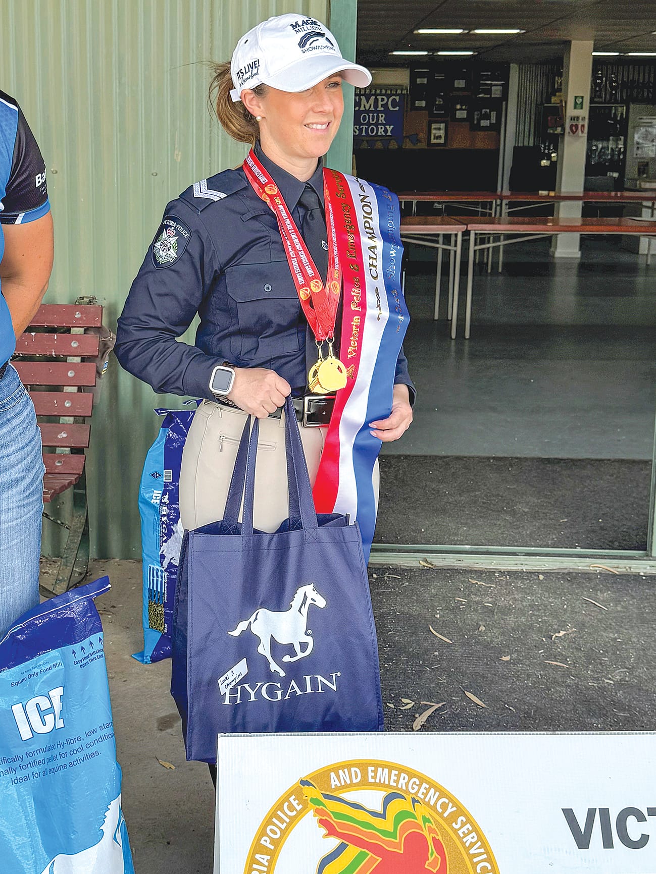 Left: Warragul constable Sam Richardson shows off her prizes at the Victoria Police and Emergency Services Games.Right: Warragul constable Sam Richardson and her horse Sylvandale Miss Vivienne at the Victoria Police and Emergency Services Games.