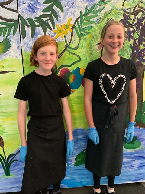 Grade six students acted as ushers at the expo - Alex Jacobs (left) and Kaitlyn Pedemont.