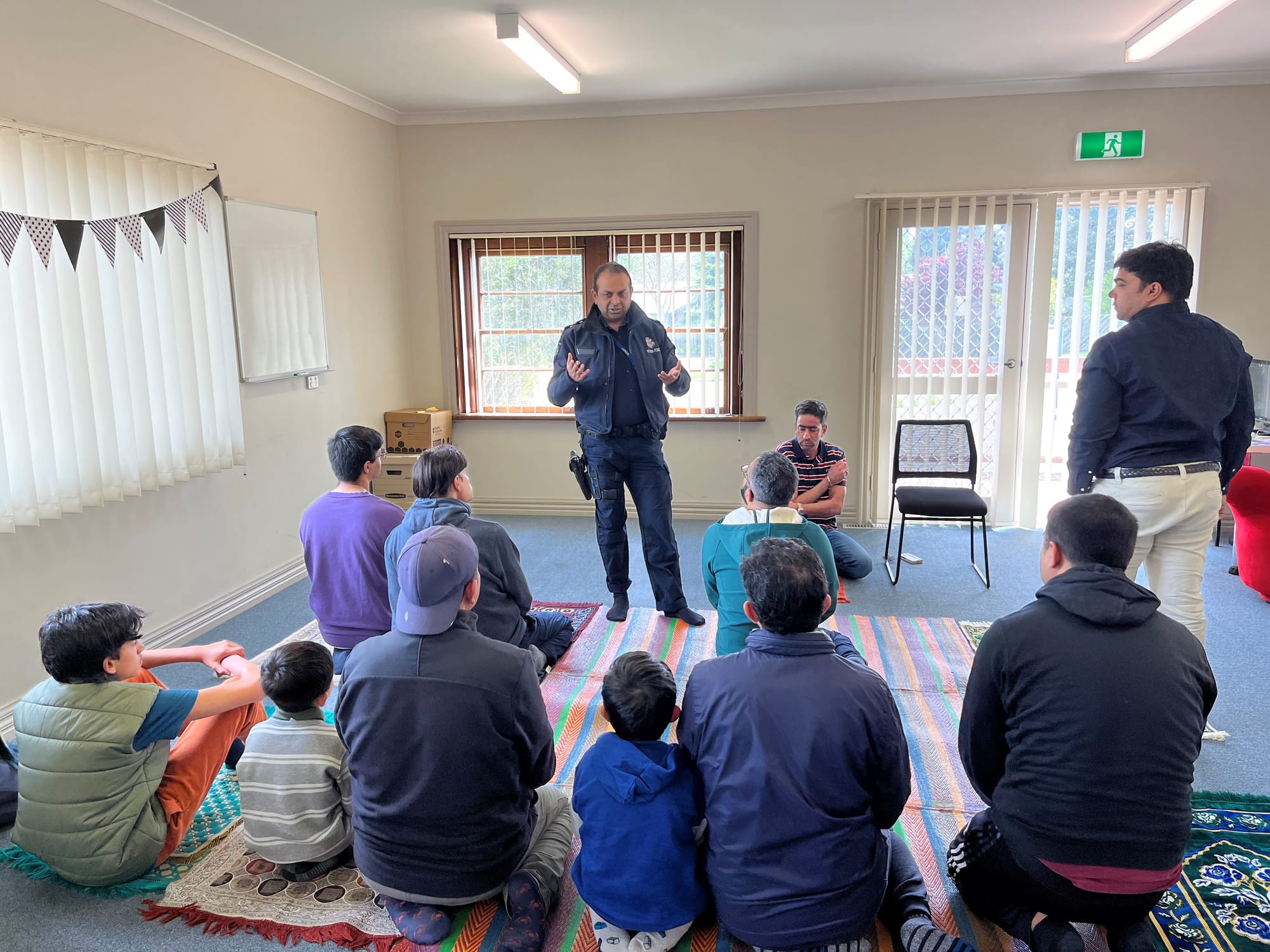 Snr Const Khan talks to members of the community at Warragul Community House.