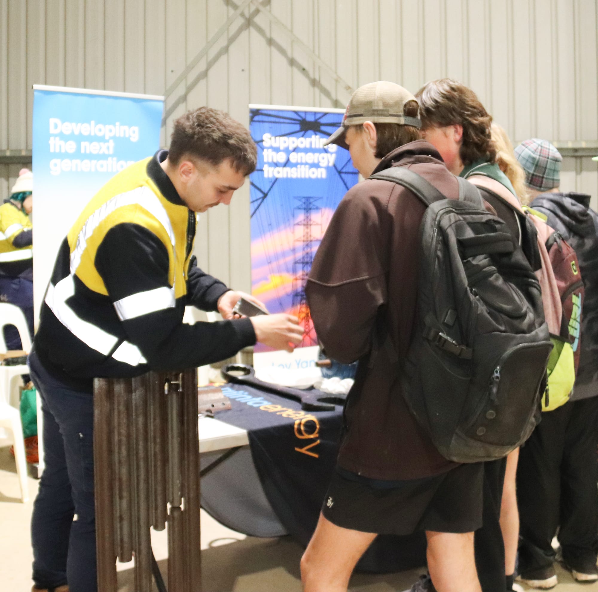 Trafalgar High School year 10 students Ray Wilms and Riley Claridge with Jackson Mackezie