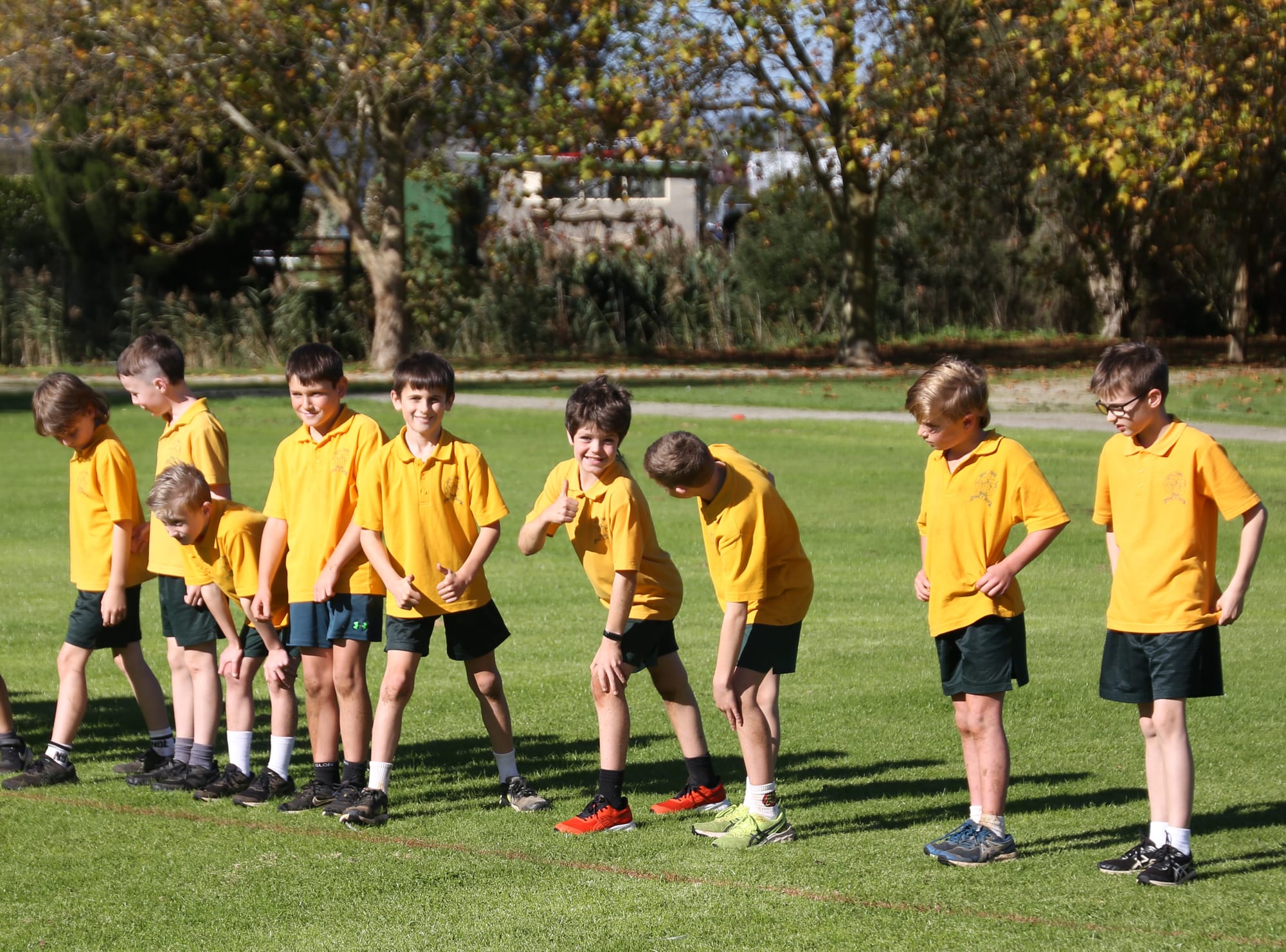 Lenny (centre) gives a thumbs up as he prepares to race in the St Joseph's Primary School cross country alongside (from left) Harvey, Zac, Ollie, Tadhg, Josh, Zac, Luke and William
