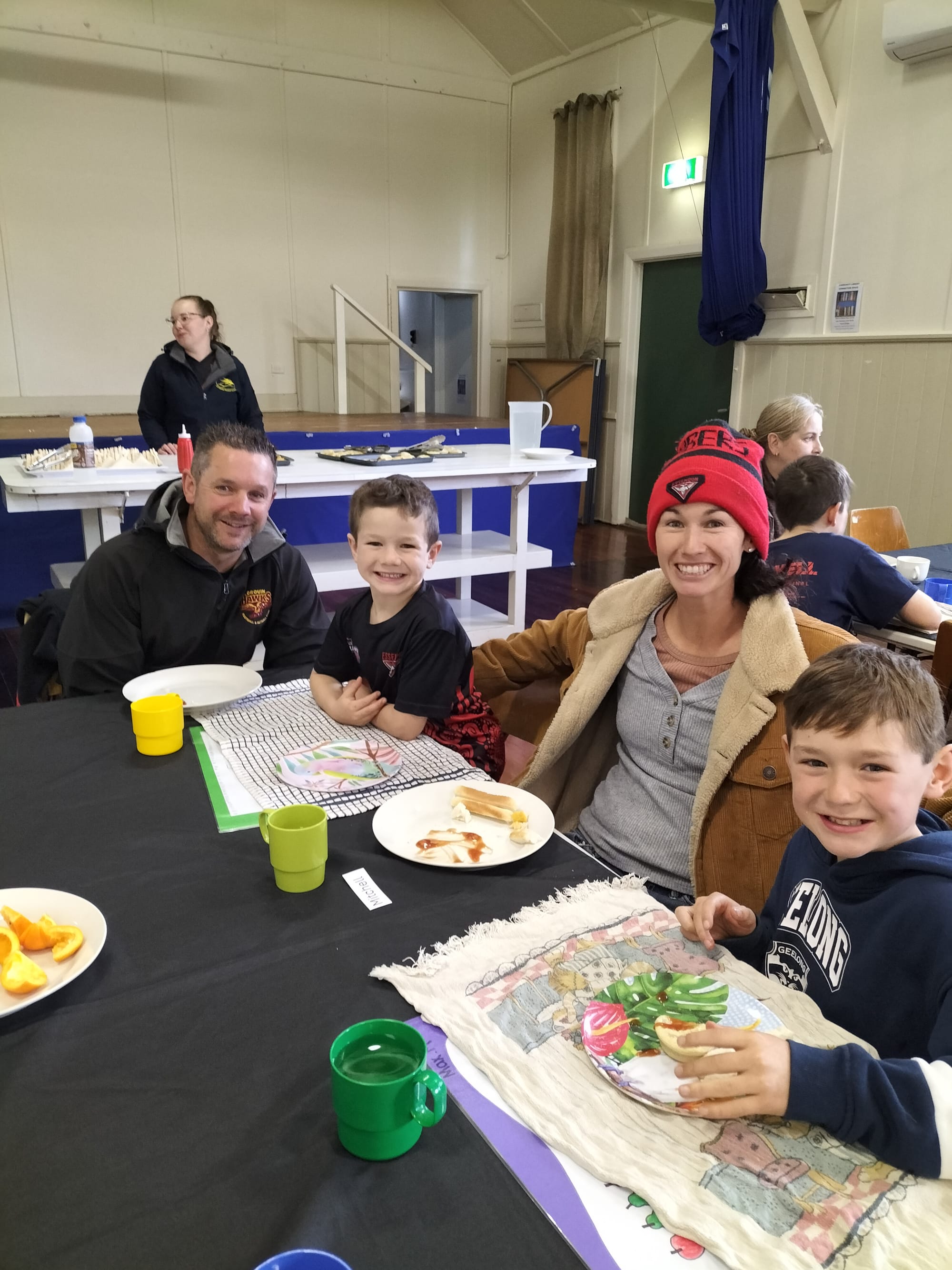 Jason Mitchell attended the family footy pie lunch after conducting a footy clinic for all students. Sons Flynn (prep) and Max (grade three) had a great time with mum Sam and dad at the family lunch.