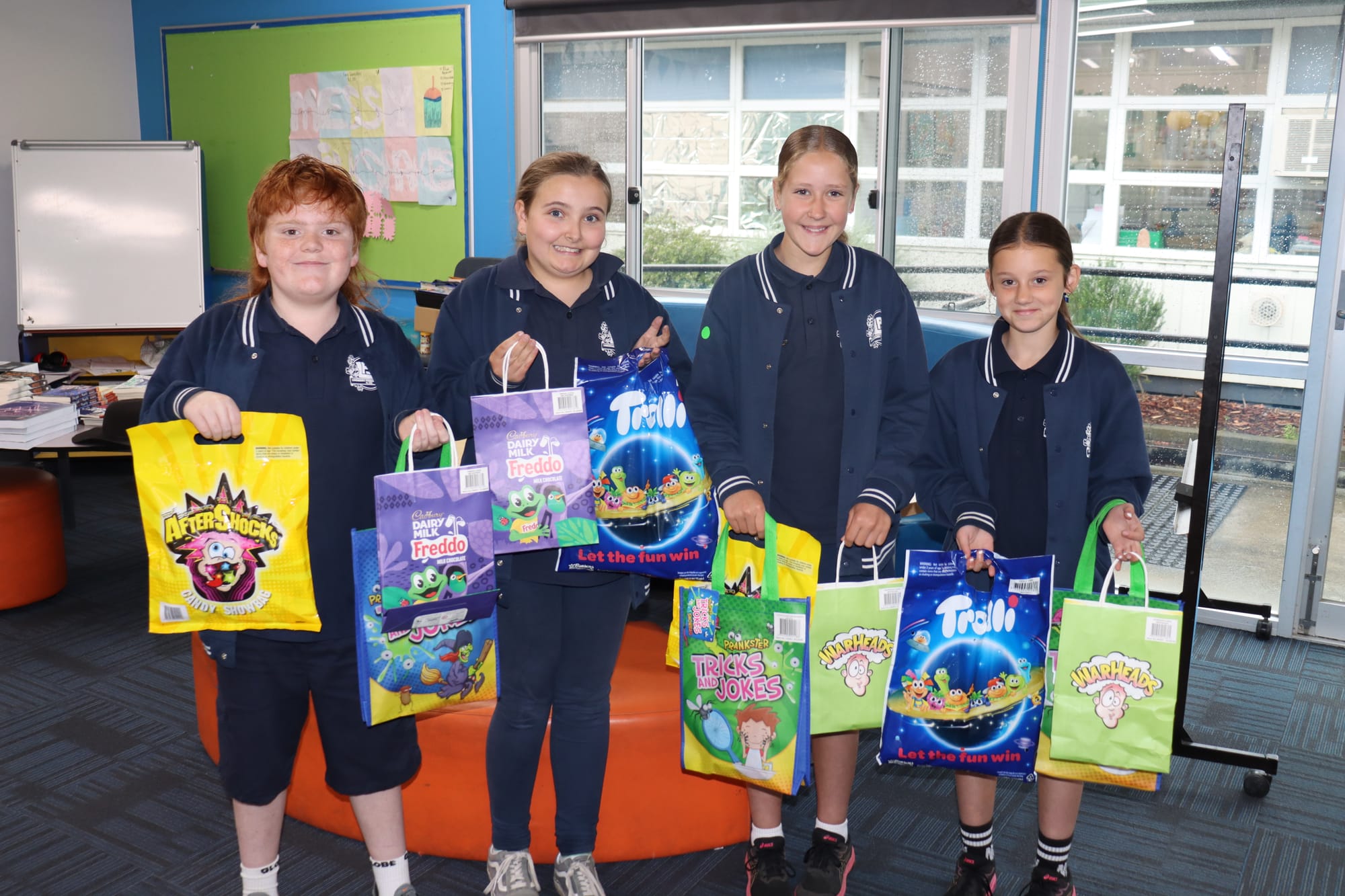 Showing off their showbags are Bohdy, Alivia, Ruby and Payton