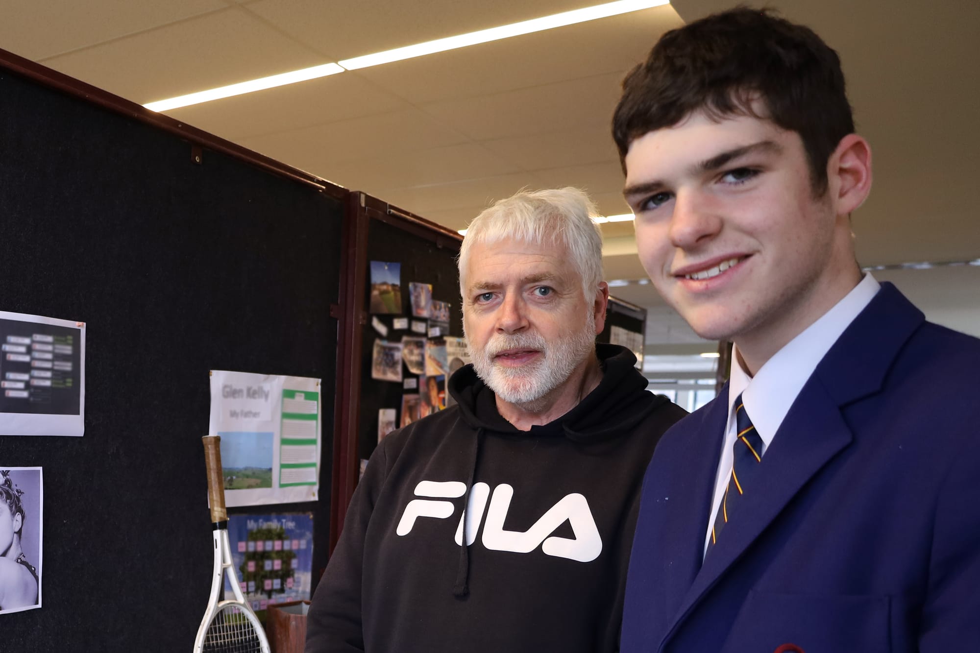 Checking out all the project exhibits are Michael Mills and Myles Lyons-Mills.