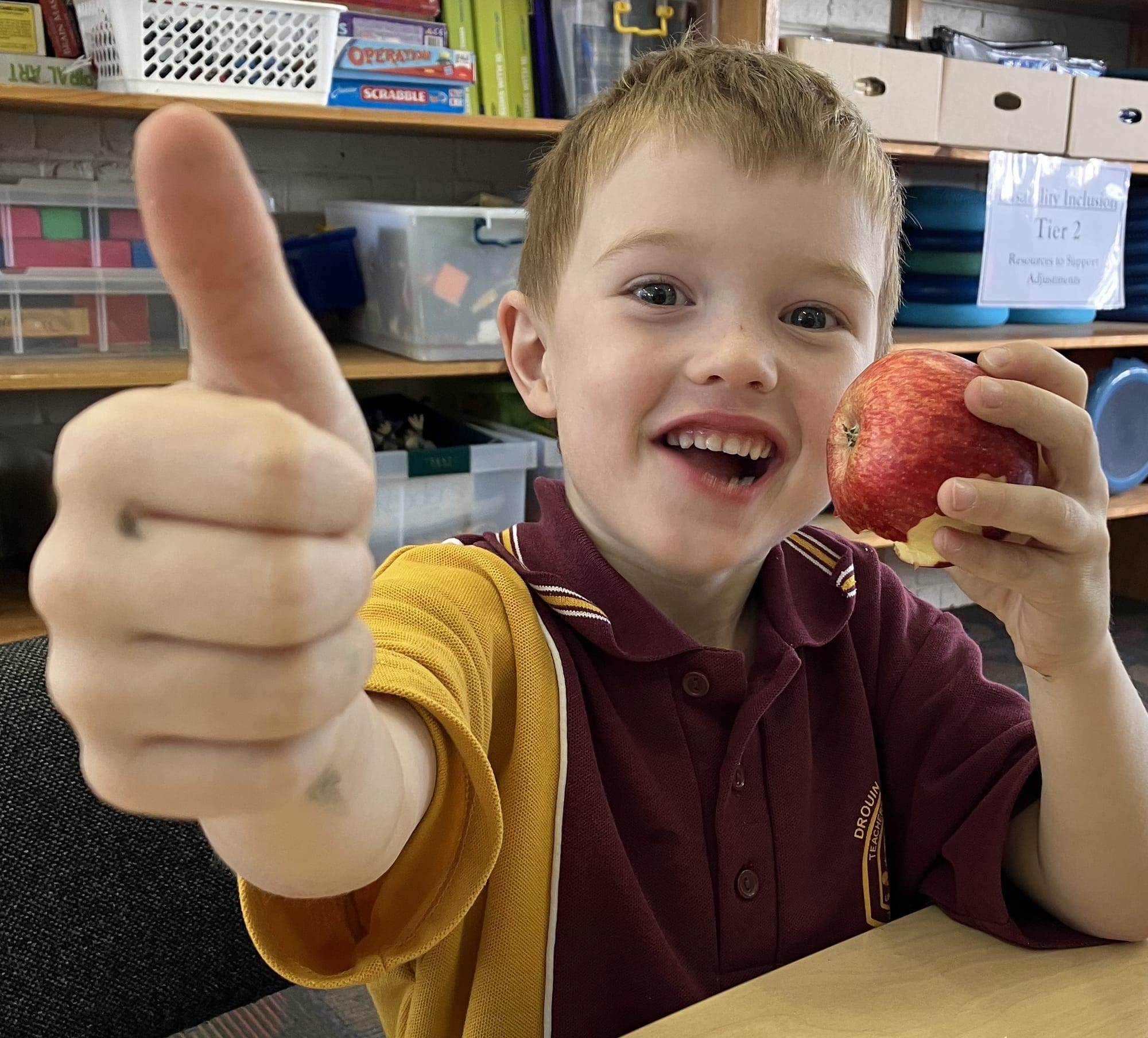 Prep student Harvey tucks into his apple as part of the competition.