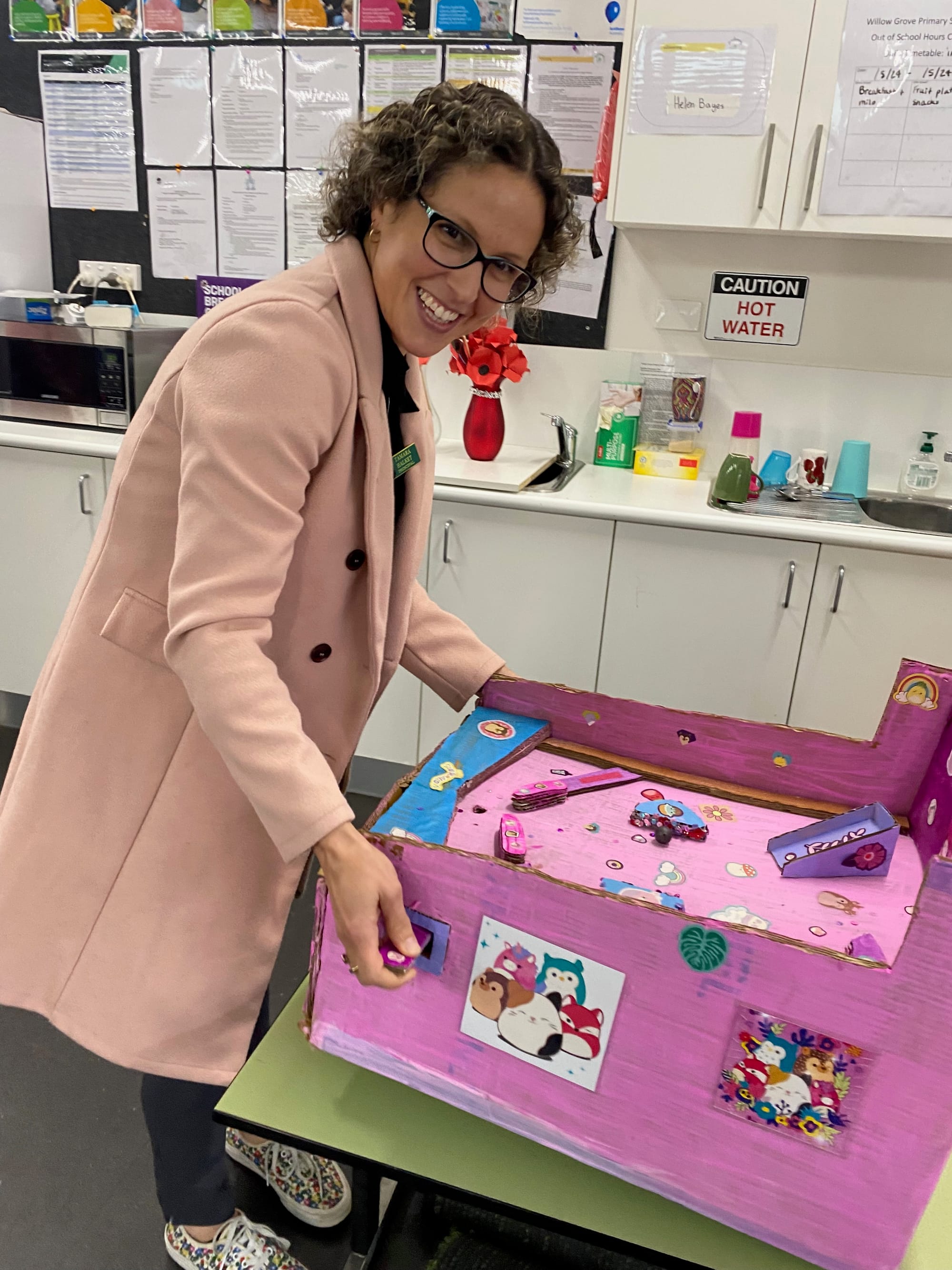 Principal of Willow Grove Primary School Tamara Halket playing a pinball machine