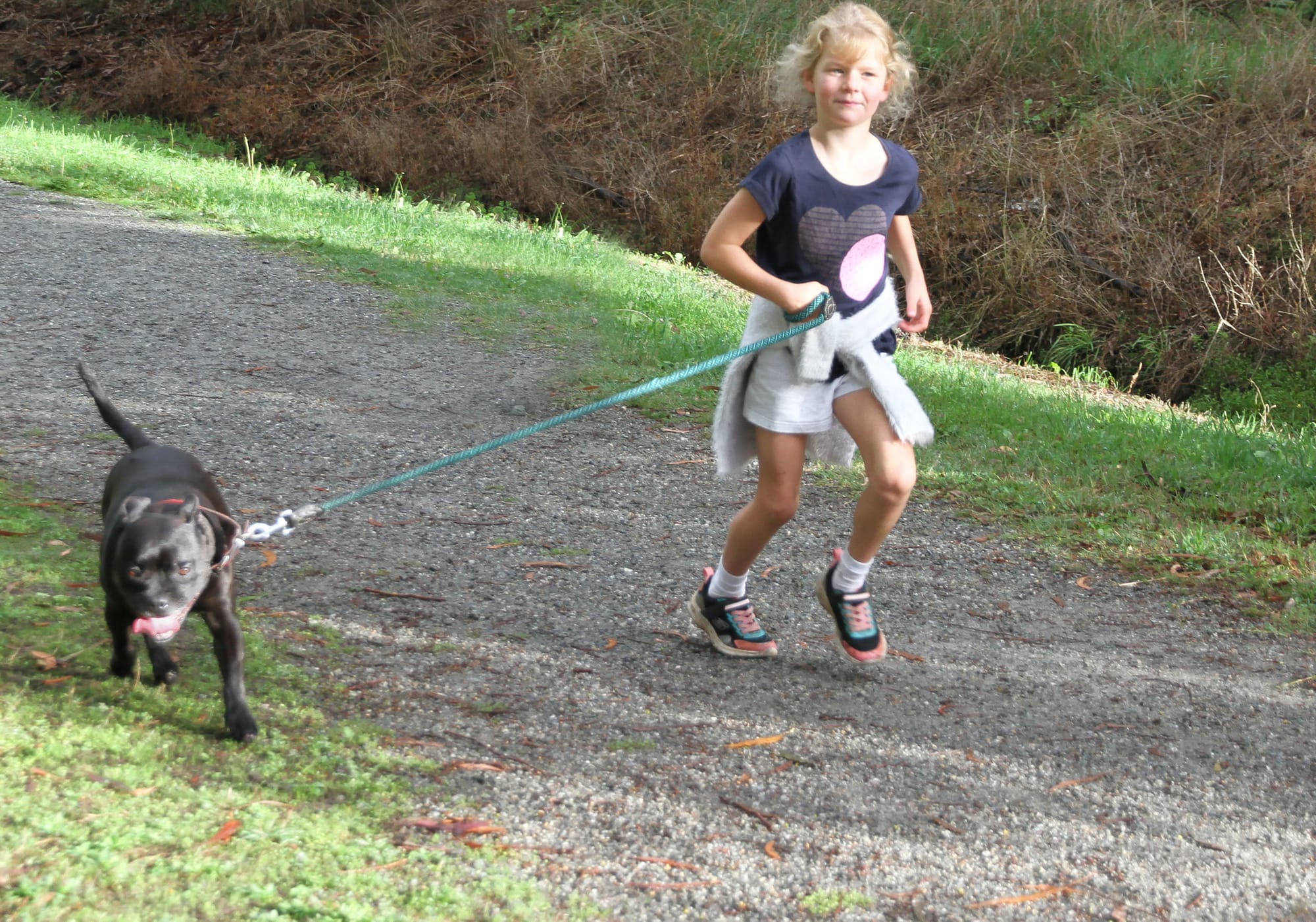 6 Year old Claudia Minichiello with her dog Wilma