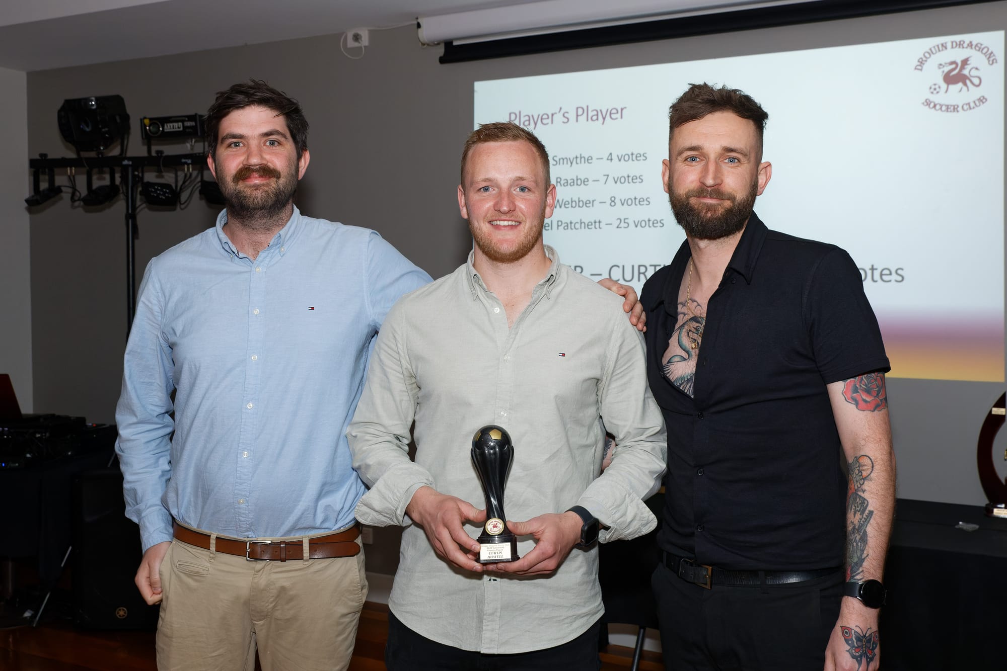 Senior best and fairest winner Curtis Howell (centre) with coaches Andy Bowmar and Jared Dean.