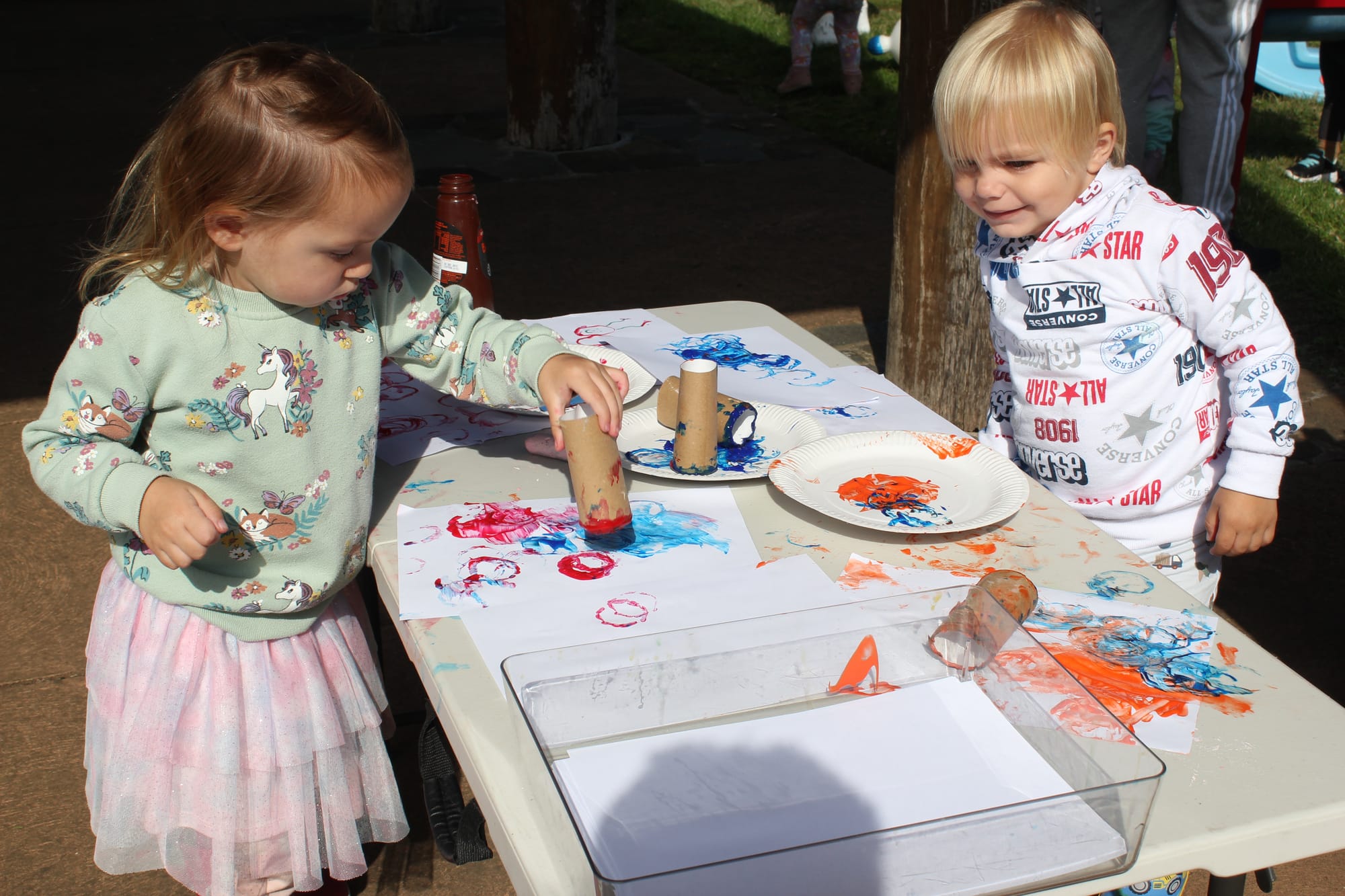 Hazel Turkovic and Micha Hamilton at the arts desk