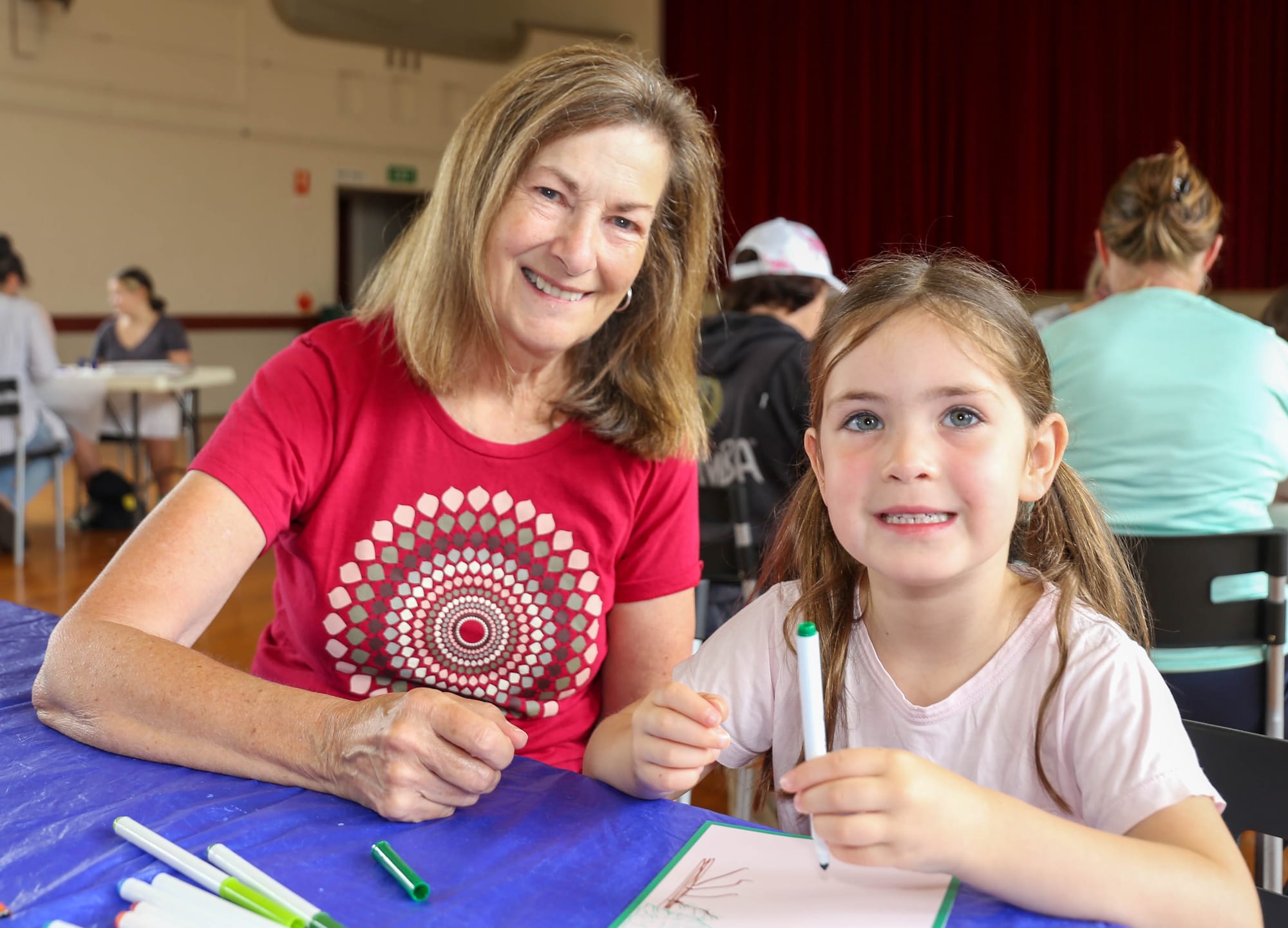 Jaquelin Robertson, from Canada, gives Trafalgar East’s Hannah Robertson a helping hand.