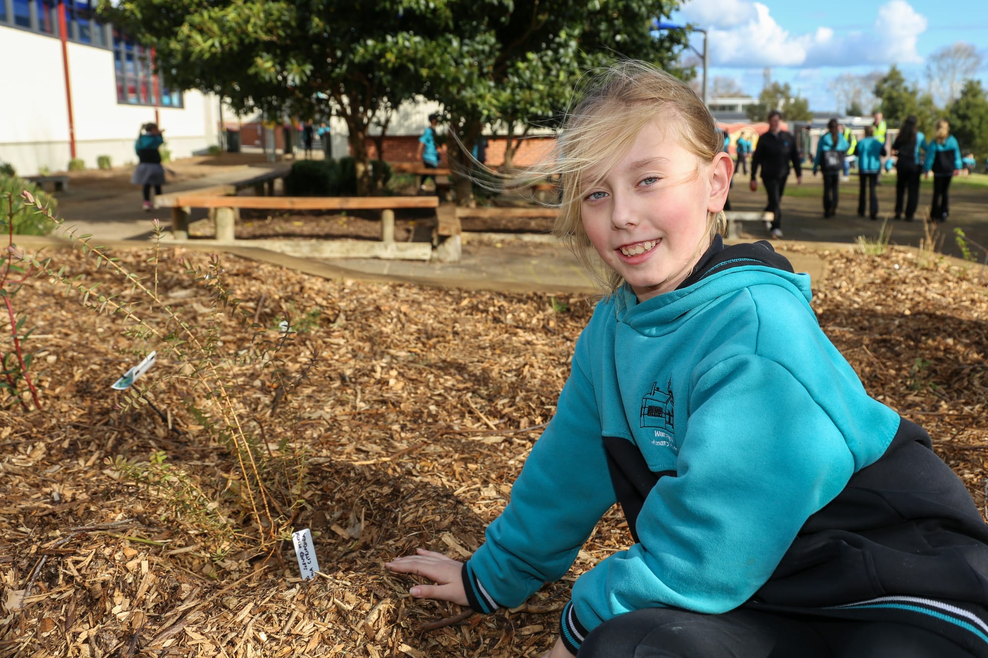 Hayley Bachelor gets close and personal with some of the new plants.
