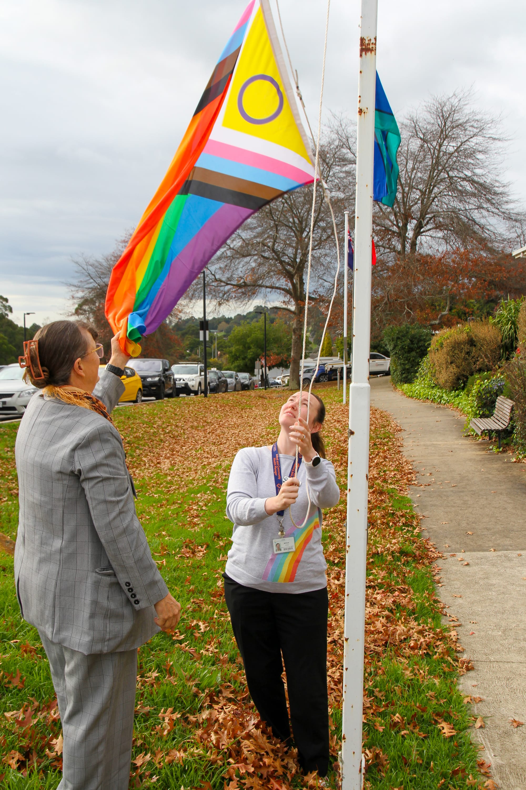 Raising the pride flag at West Gippsland Hospital on Friday morning is West Gippsland Healthcare Group dietetics manager Nicole Boyer.