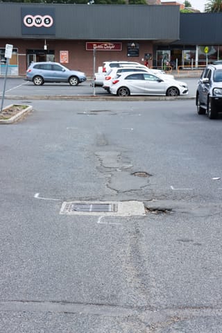 Pot Holes Woolies Carpark - 10.02.2022