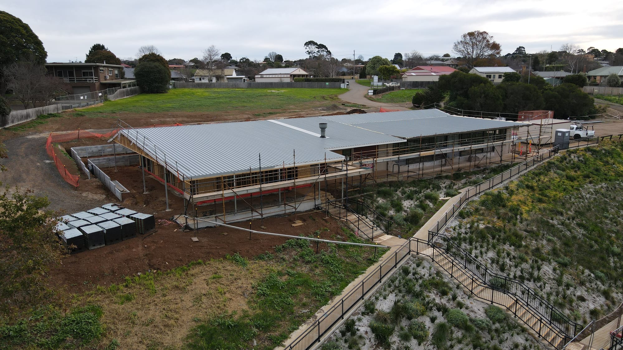The frames and roof are completed as works progress on the $2.9 million soccer pavilion refurbishment at Baxter Park in Warragul.