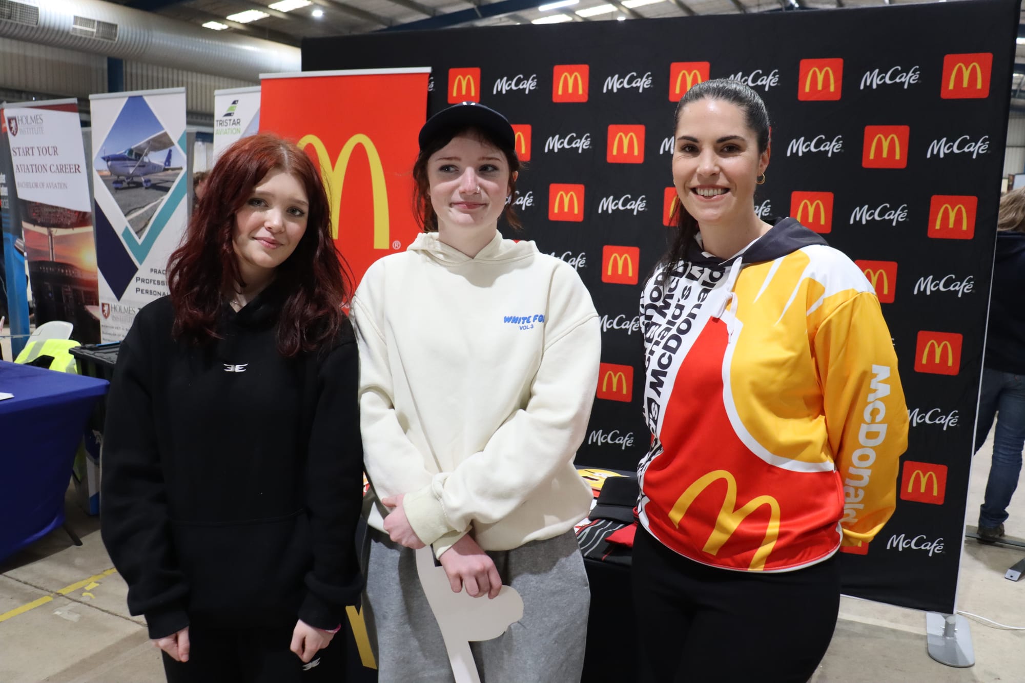 ECG Warragul students Ede Lockwood and Tyler Van der Wolde with McDonald's Felicity Wilson.