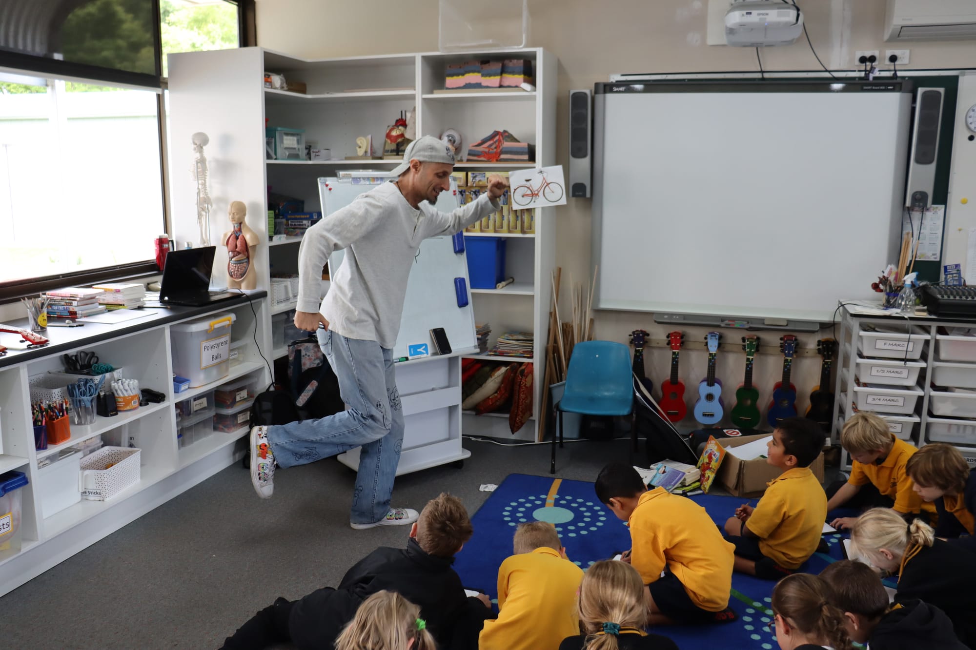 Author Adam Wallace showing how stick figures can easily be used to create artwork for books