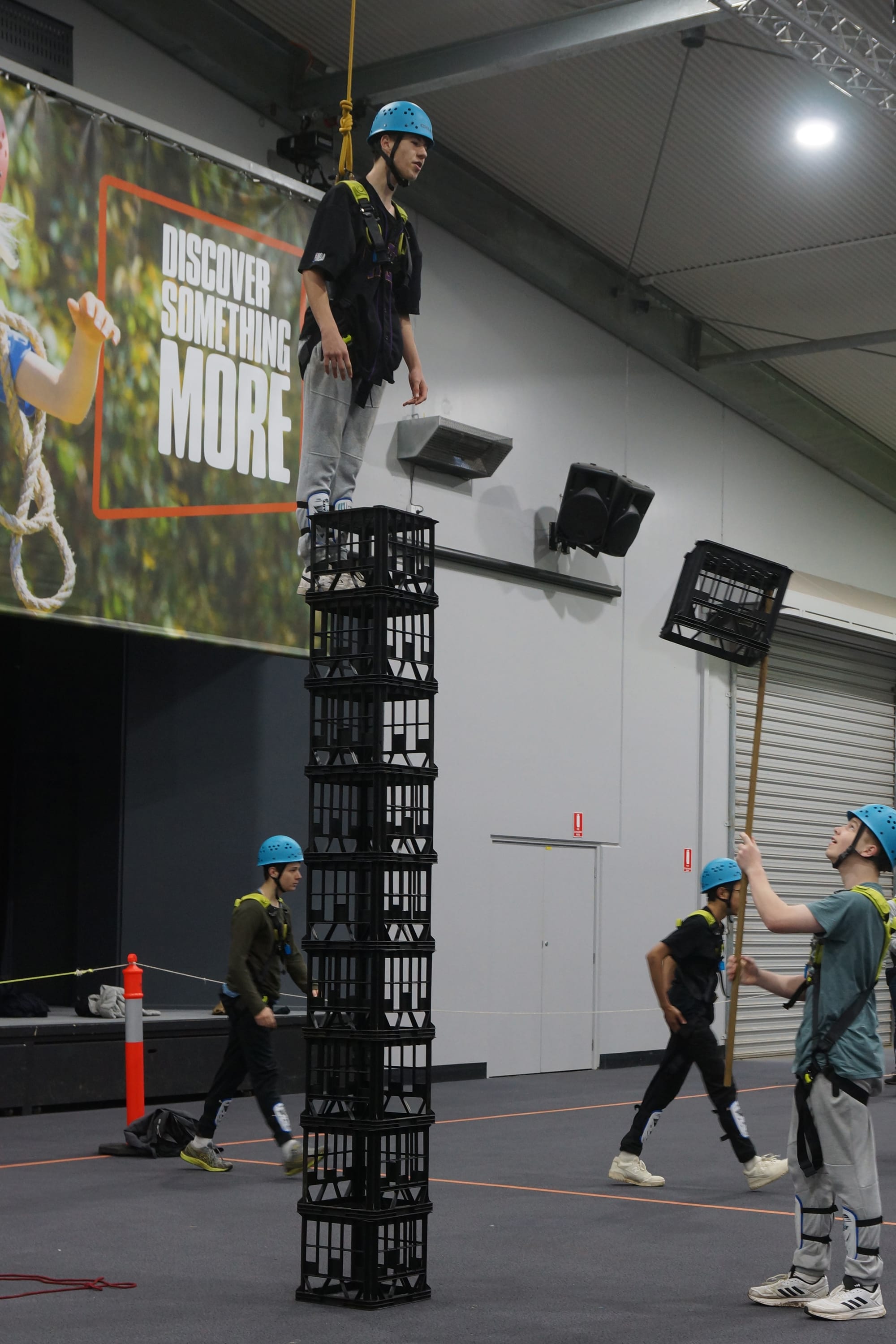 George Bennett assisting Tully Anderson with the crate challenge.